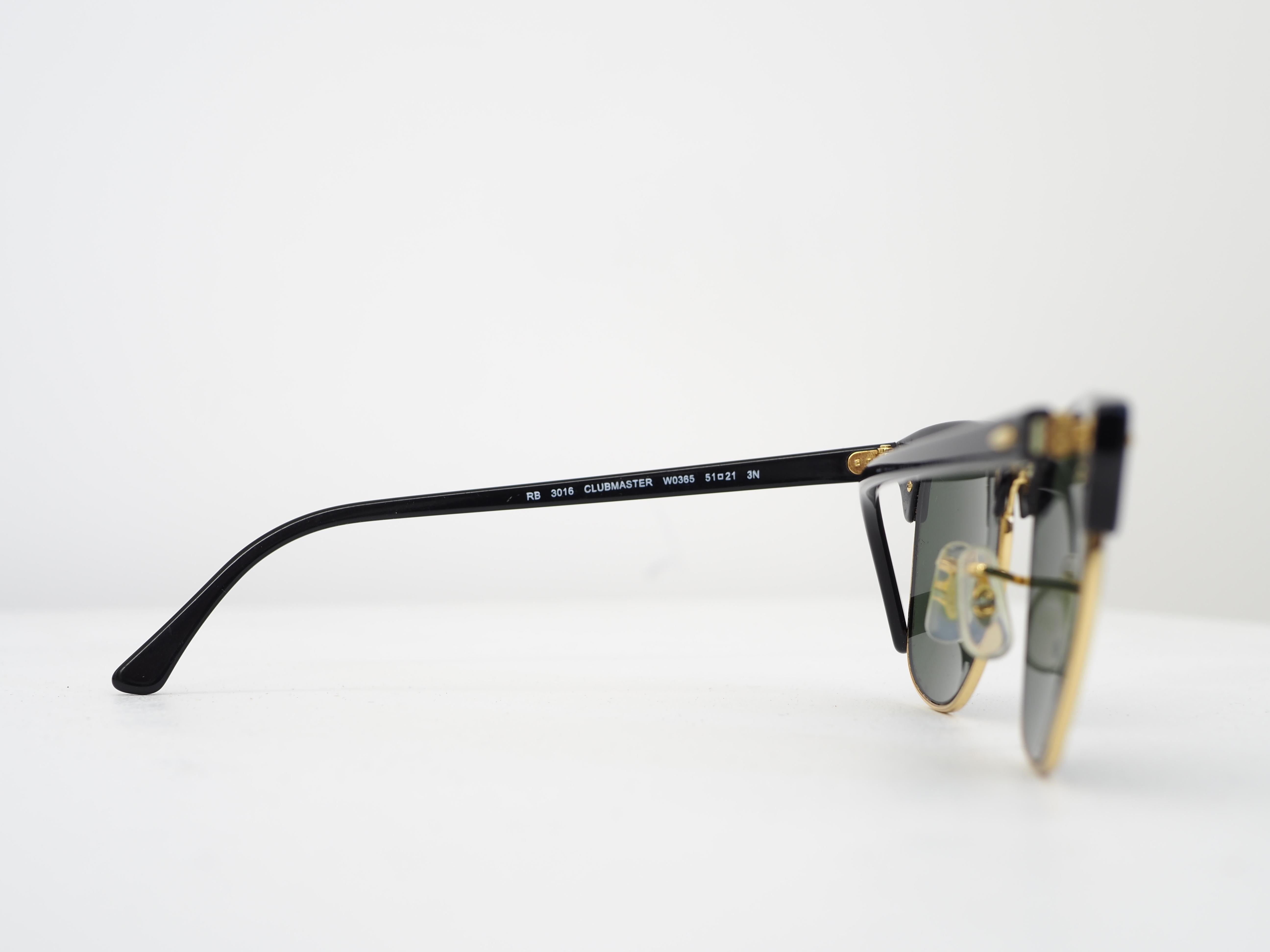 Schwarzgoldene Sonnenbrille von Ray-Ban für Damen oder Herren im Angebot
