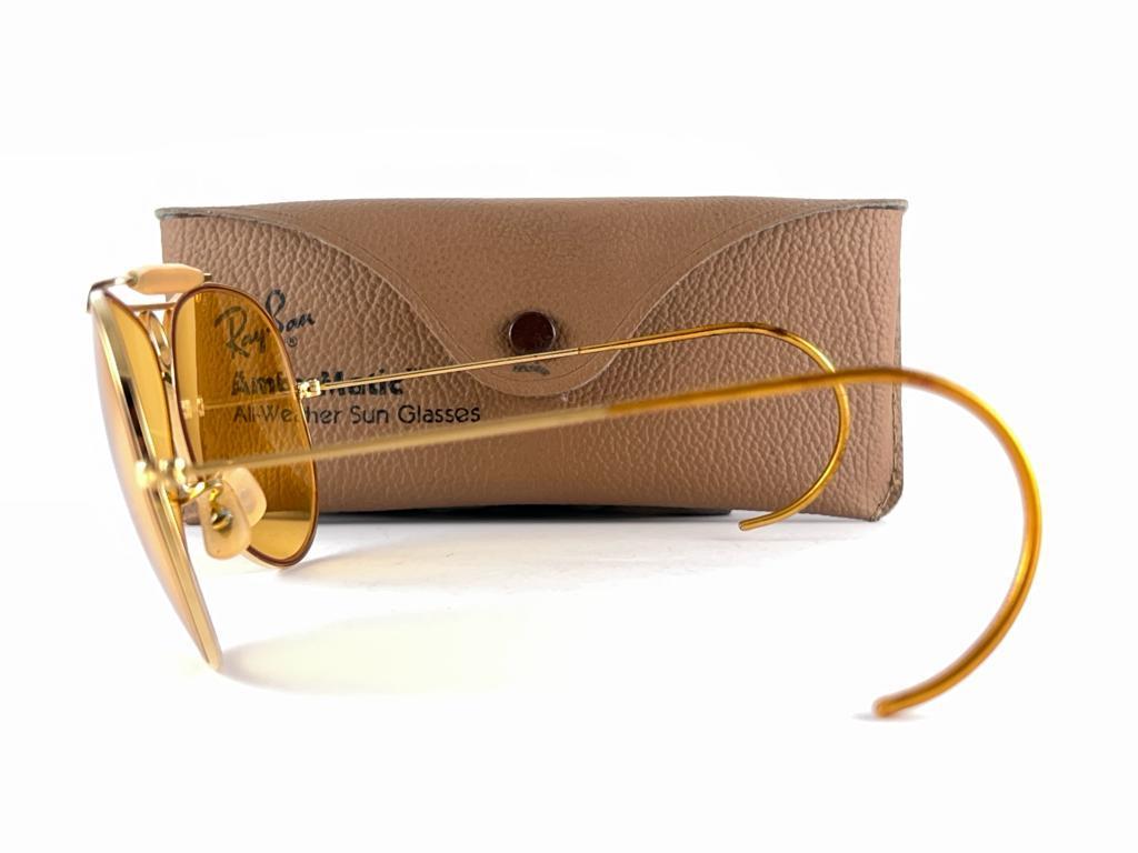 Ray Ban Vintage Aviator Gold Ambermatic Shooter 62Mm B / L Sonnenbrille, 1970er Jahre  für Damen oder Herren im Angebot