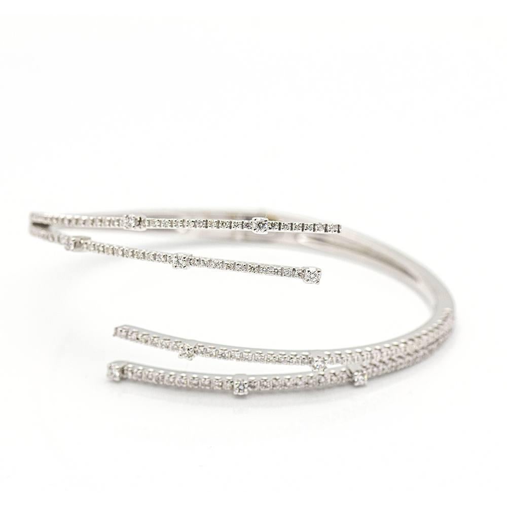 Women's Rigid Bracelet in White Gold and Diamonds  144x Brilliant Cut Diamonds with a total weight of 1.33cts in G/VS quality  18kt White Gold  25.85 grams  6.0 cm diameter  Clasp system with back opening  Brand new product  Ref: D359739LF