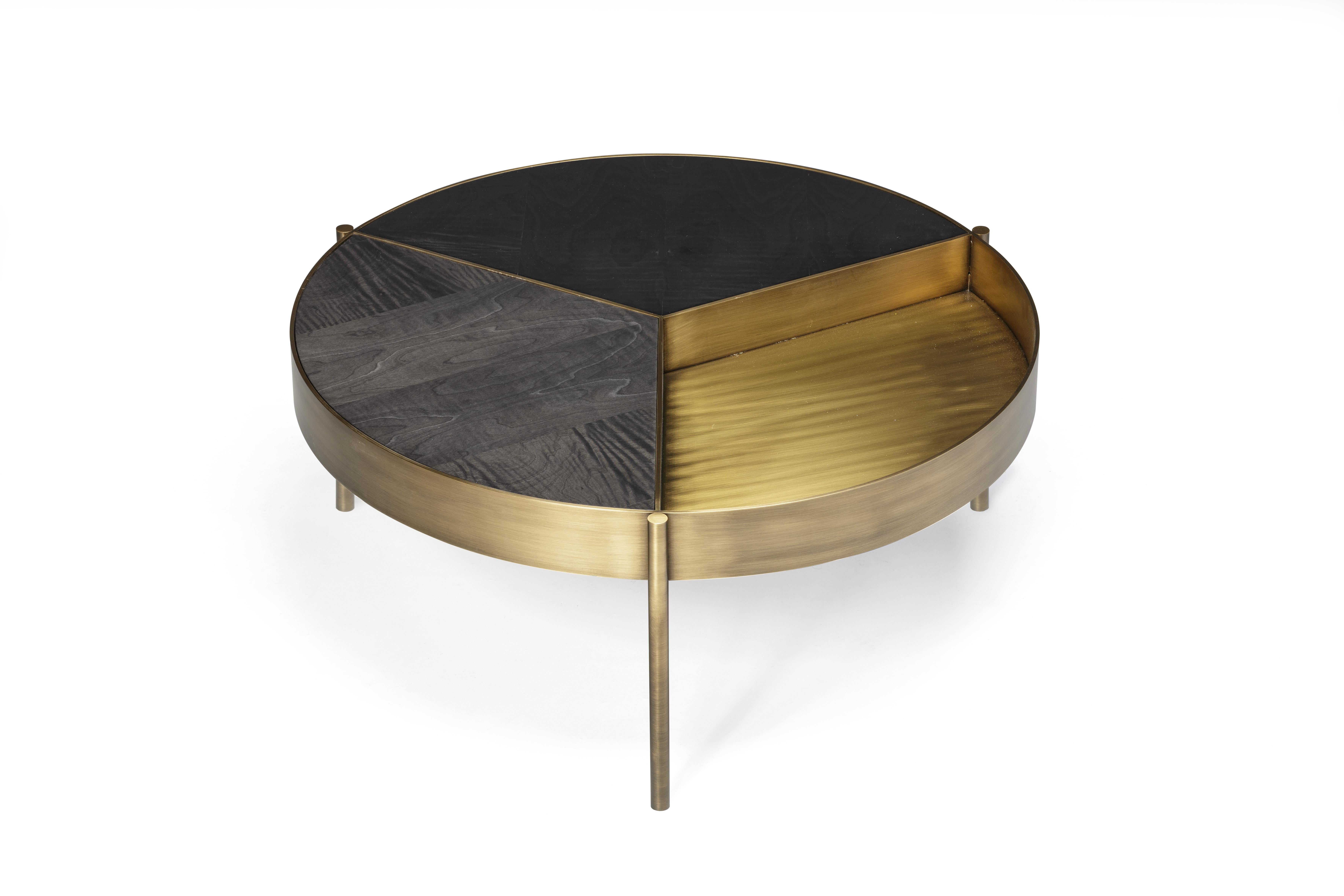 Ray Coffee Table, Bronze Structure and Nero Marquina Top, Handcrafted by Duistt

Ray coffee table is a combination of elegance and versatility. its three delicate rays confine division to the tabletop, allowing customization and creativity with our