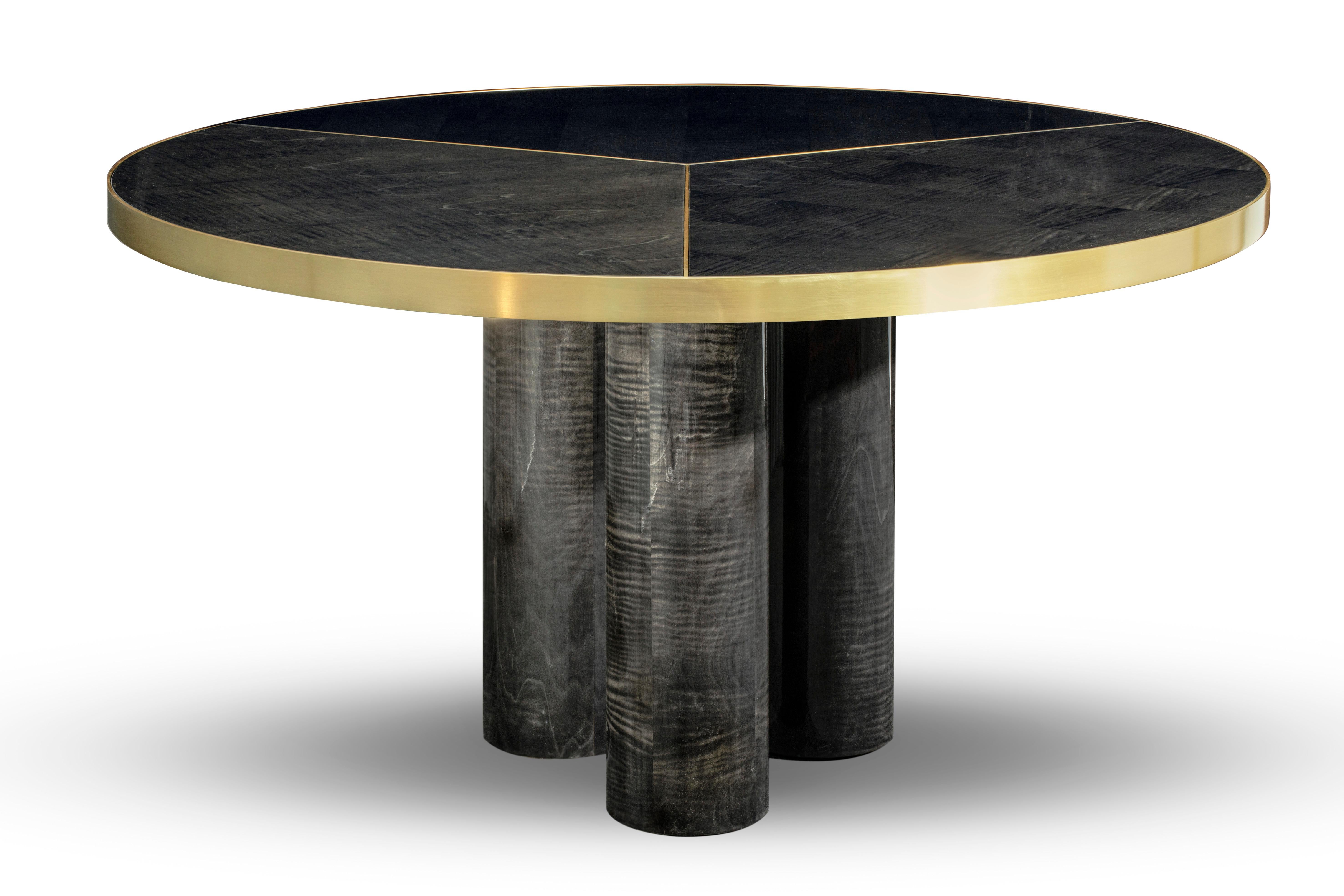 Ray Dining Table by DUISTT
Dimensions: D 145 x H 77 cm
Materials: High Gloss Sikomoro Frise and Brass

Unlike its primary design, the RAY dining table is presented with a sturdier figure. The delicate brushed brass lines define and give dimension to