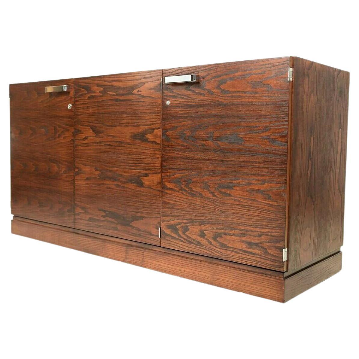 Gordon Russell office cabinet

A Ray Leigh for Gordon Russell mid-century office cabinet, made in England. 

This beautifully crafted rosewood cabinet is fitted with double doors plus a single door to the cupboard finished with chrome handles.