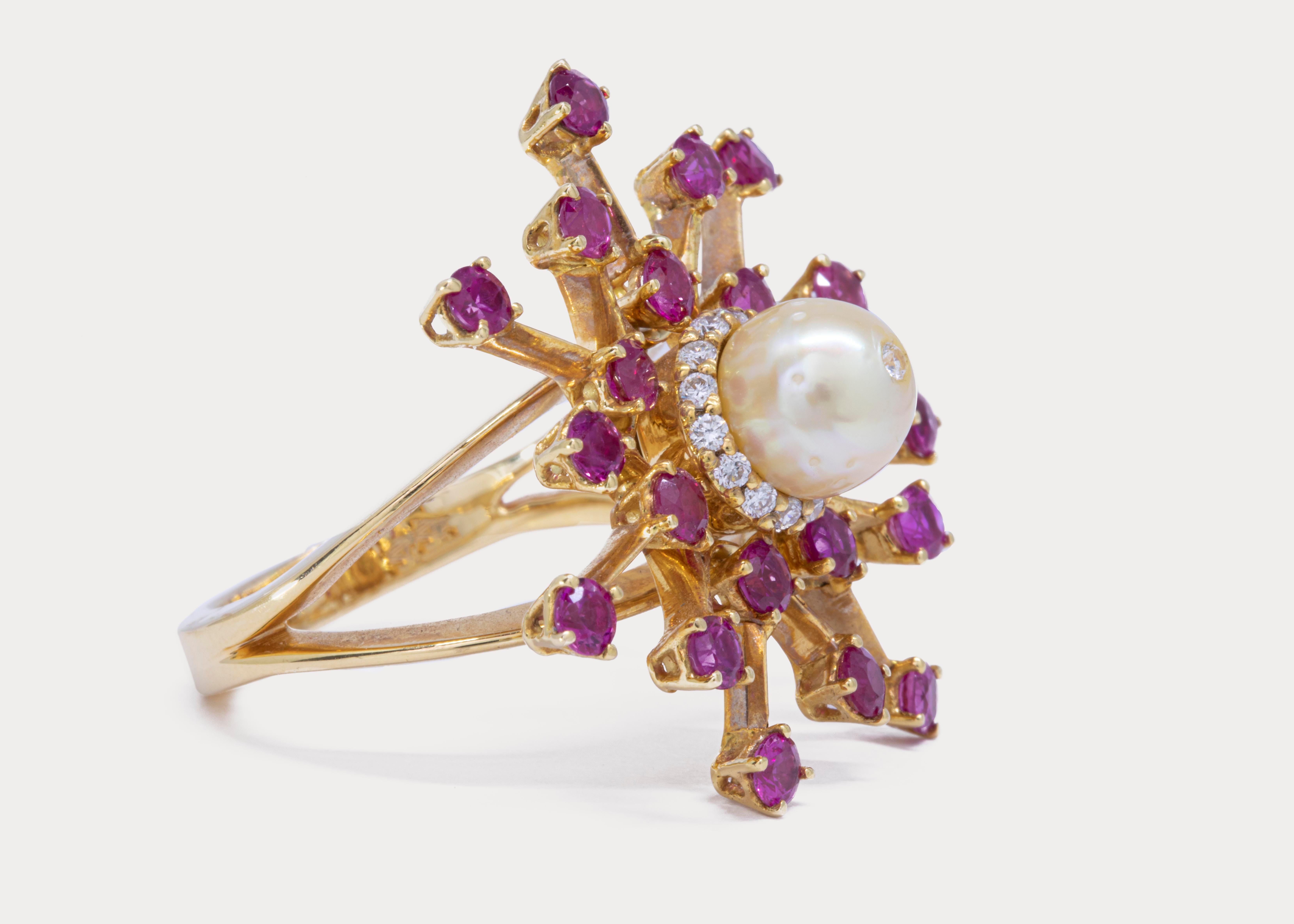 An 18k yellow gold ring centered with a drilled natural Bahraini Pearl surrounded by a diamond halo.
2.8 ct of flawless round rubies accentuate the cream colored pearl.

Gold Weight: 12.54
Pearl Weight: 3.12 ct.
Rubies Weight: 2.8 ct.
Diamonds