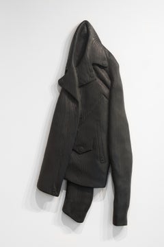 LEATHER JACKET - Black stained wood, carved wood sculpture