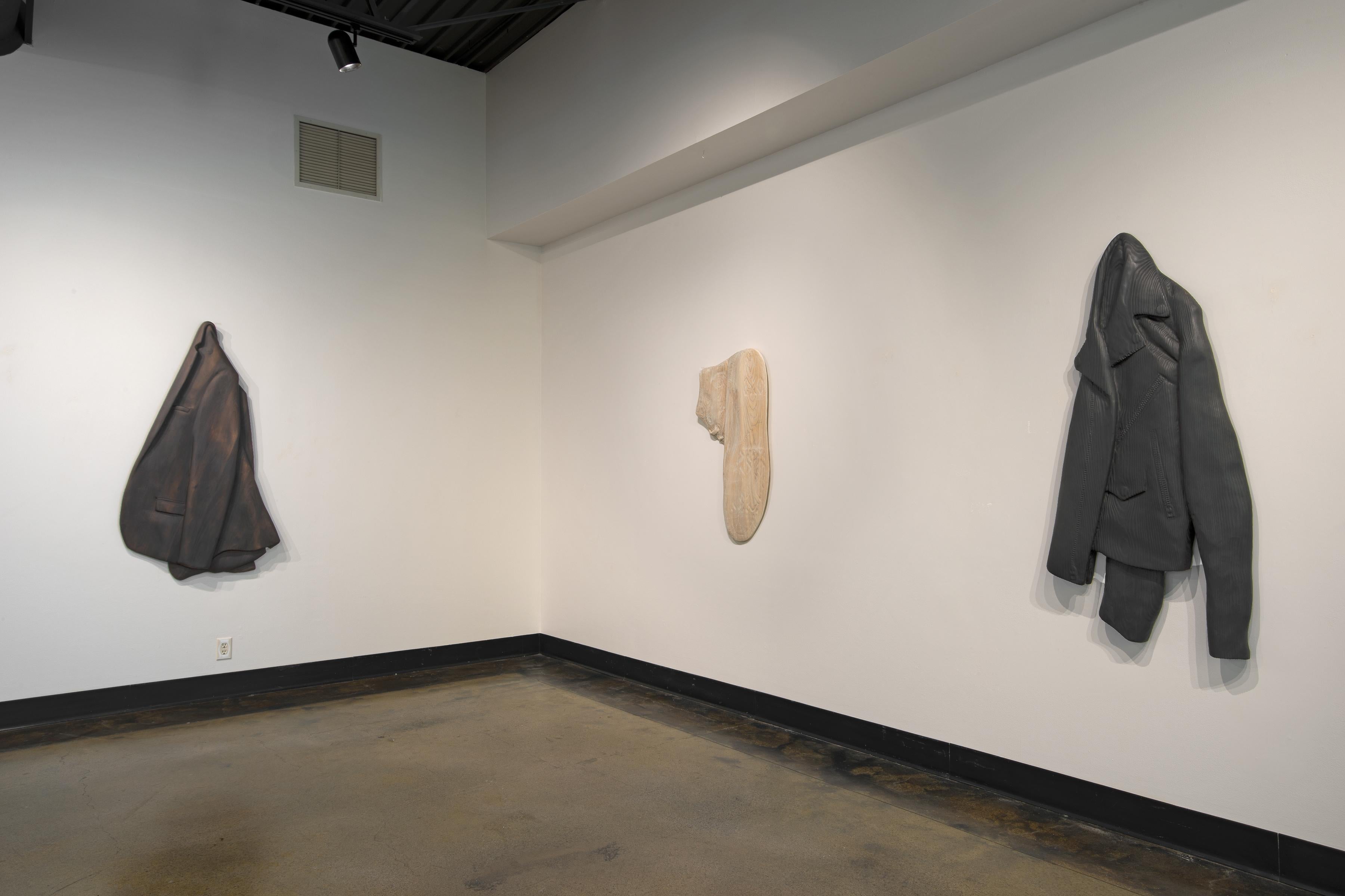 SUIT JACKET - stained wooden hanging sculpture, brown, carved wood - Brown Figurative Sculpture by Ray Padron