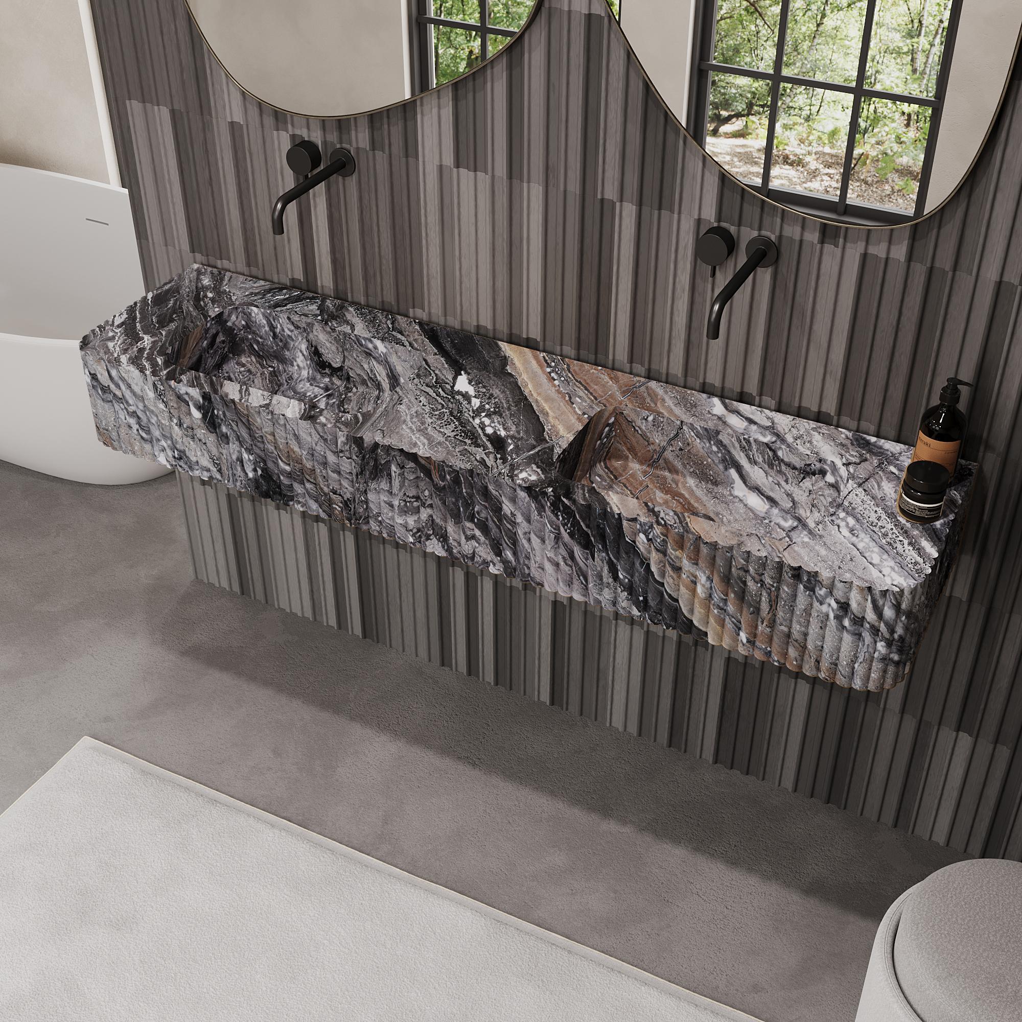 Accentuate your bathroom space with our beautiful Ribbed Raya Dual Marble Basin, a perfect fusion of minimalist design and natural elegance. The beautiful ribbed detailing creates a unique visual appeal while highlighting the unique veining and