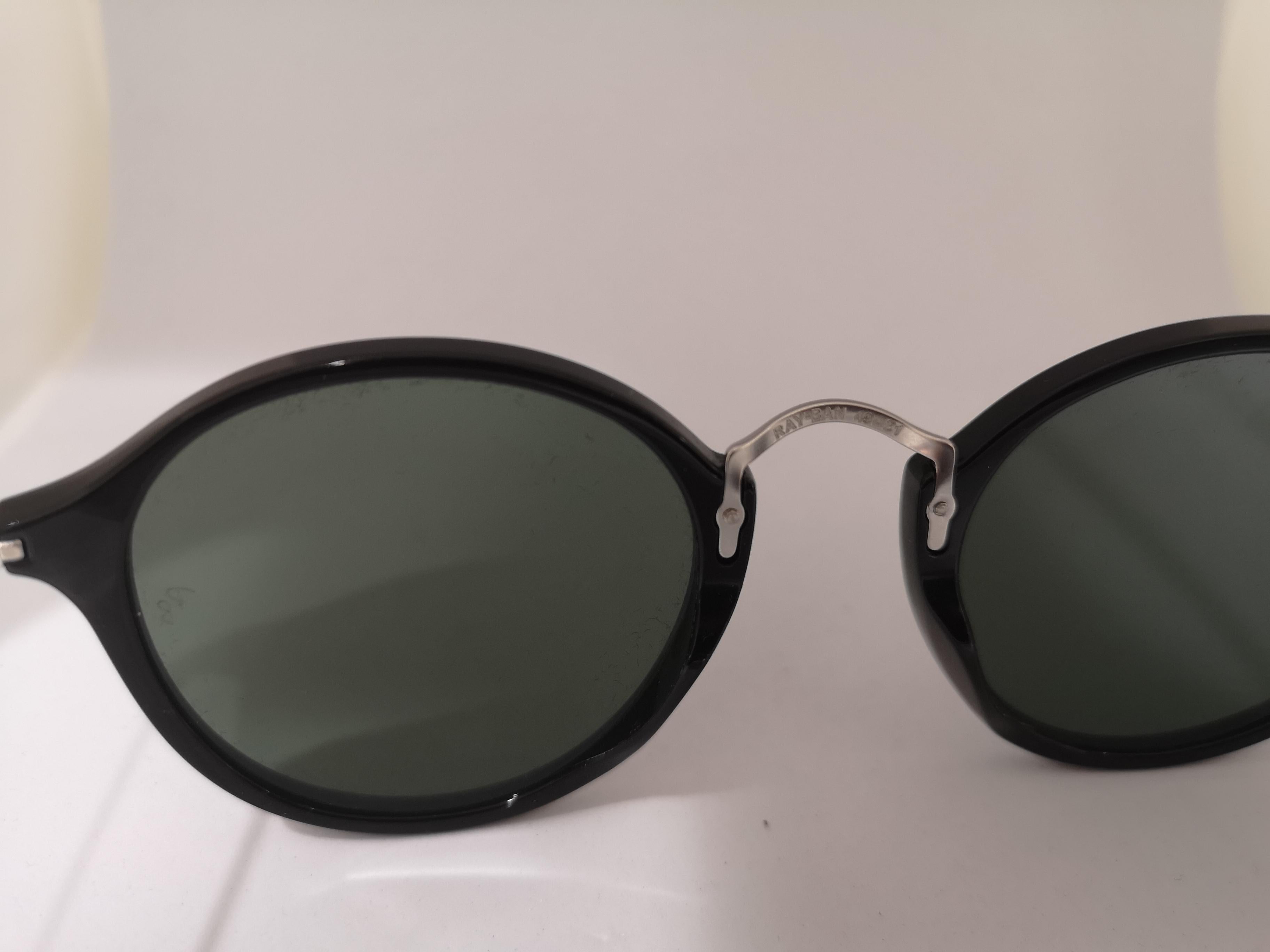 Black Rayban black sunglasses