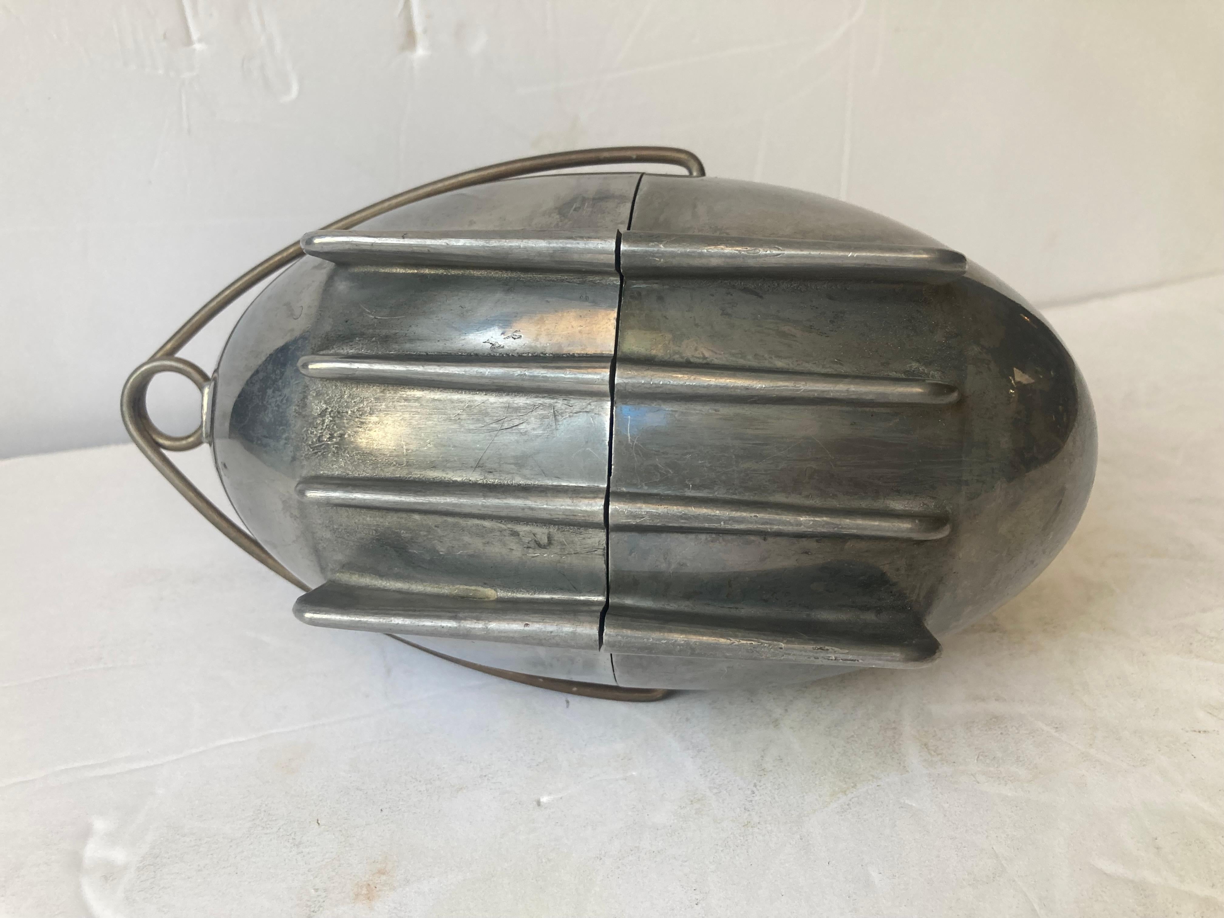 Amazing Art Deco Machine age aluminum potato baker designed by Raymond Barton. No box.