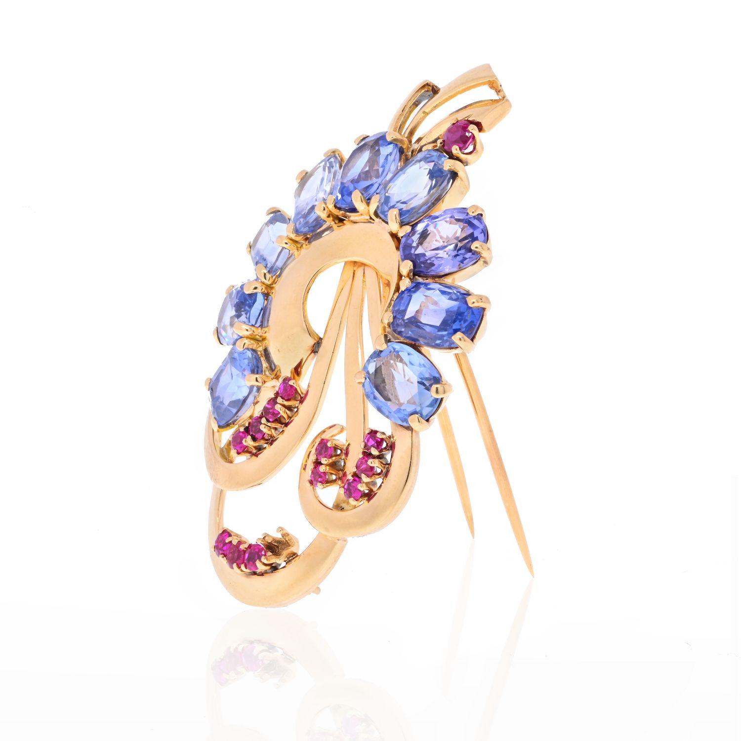 Made by one of the most influential jewelry designers of the early twentieth century, Raymond C. Yard this exciting brooch is as beautiful today as it was 80 years ago!
Crafted in 14K Rose Gold mounte with cushion cut sapphires and round cut rubies