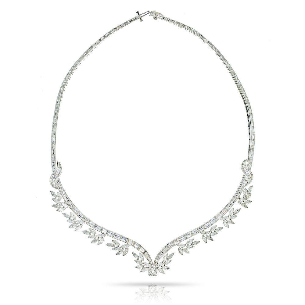 Magnificent diamond necklace by Raymond C. Yard. crafted in Platinum mounted with baguette, marquise, round cut and a pear cut diamond drop.
Pear Cut diamond is certified by GIA 1.89ct D color SI1 clarity. 
Total carat weight of side diamonds: