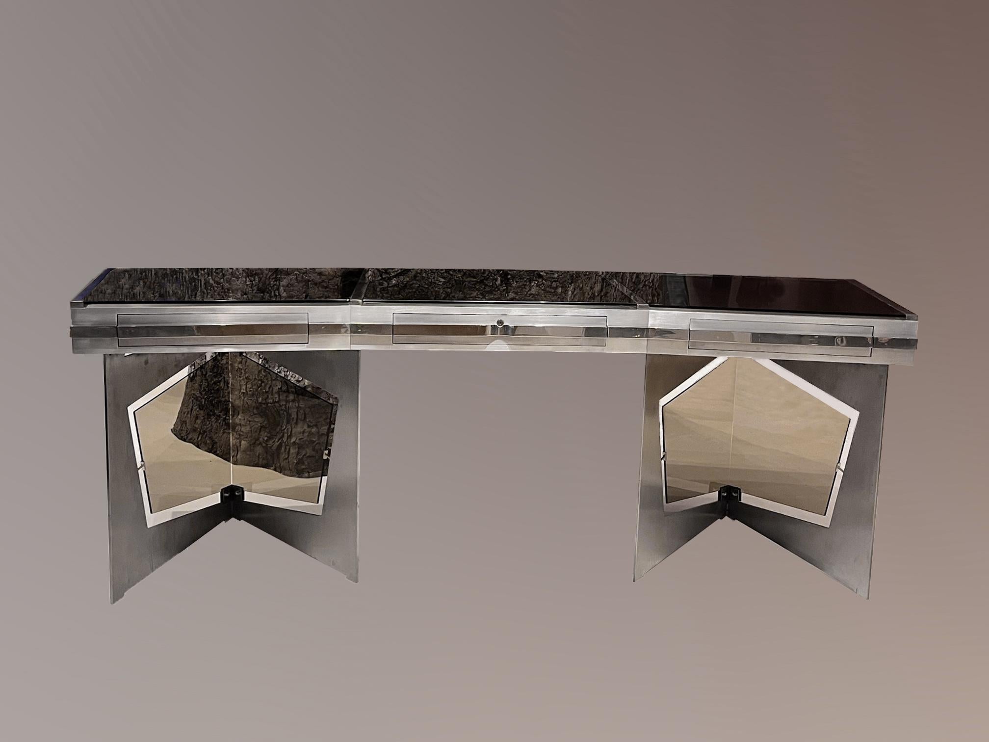 Raymond Cohen
Desk by Raymond Cohen. Steel, smoked glass and inox.
France, 1970s.
H. 79 cm, L. 230 cm, P. 74 cm