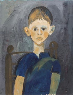 Portrait d'un garçon dans une chaise