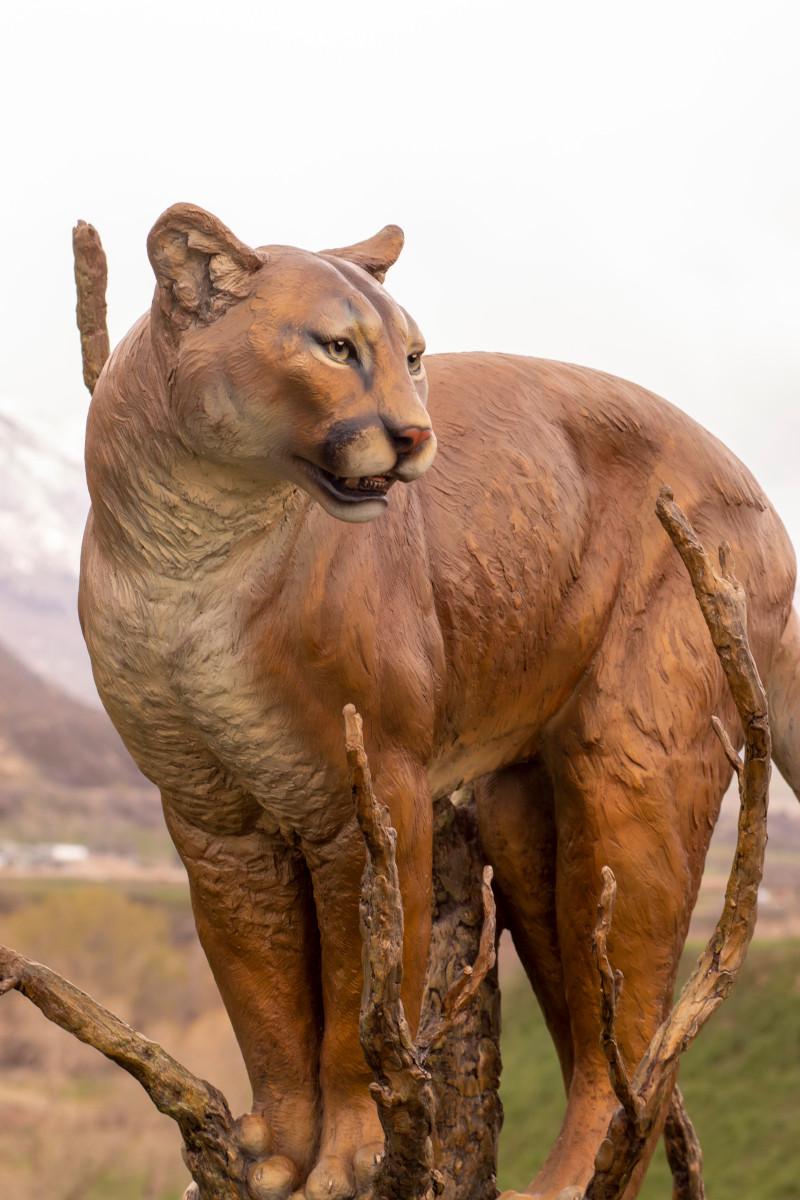 Under Watchful Eyes - Realist Sculpture by Raymond Gibby