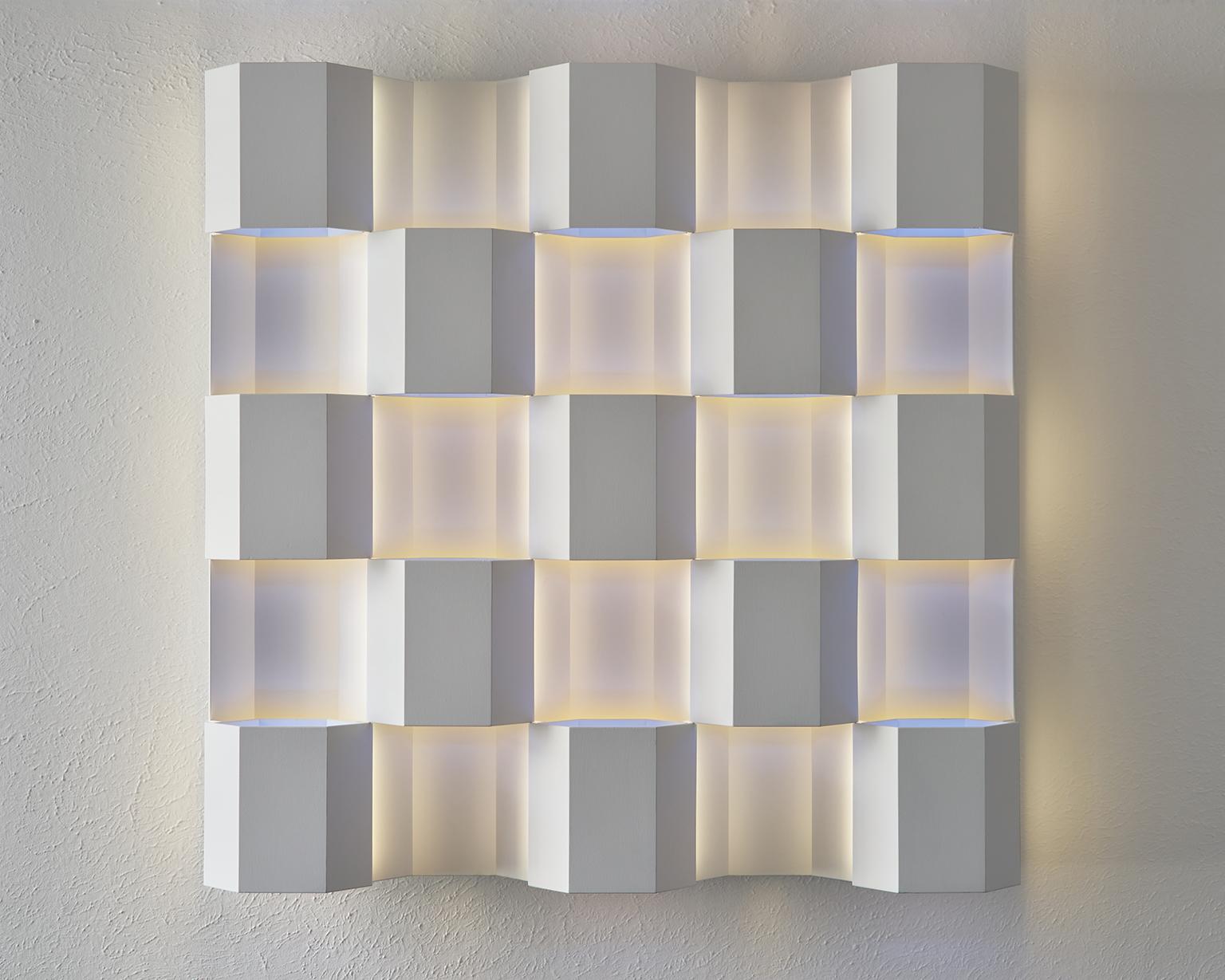 Raymond Graber's celestial light sculptures transform the sense of perception, challenging the human eye’s sense for scale and time with a transcendental perceptual experience. 

In an ethereal interplay between light and space, Graber’s light