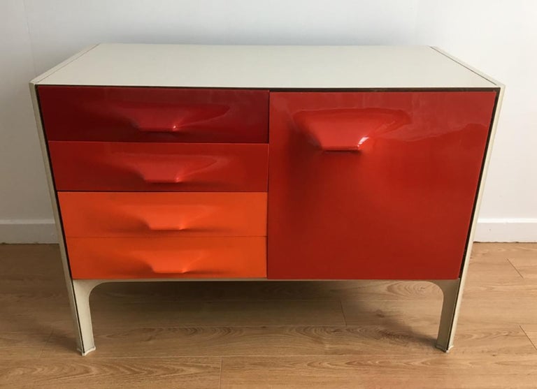 Amazing cabinet designed by Raymond Loewy. DF-2000 X-line series with three ABS plastic drawers and door cabinet in four color shades.