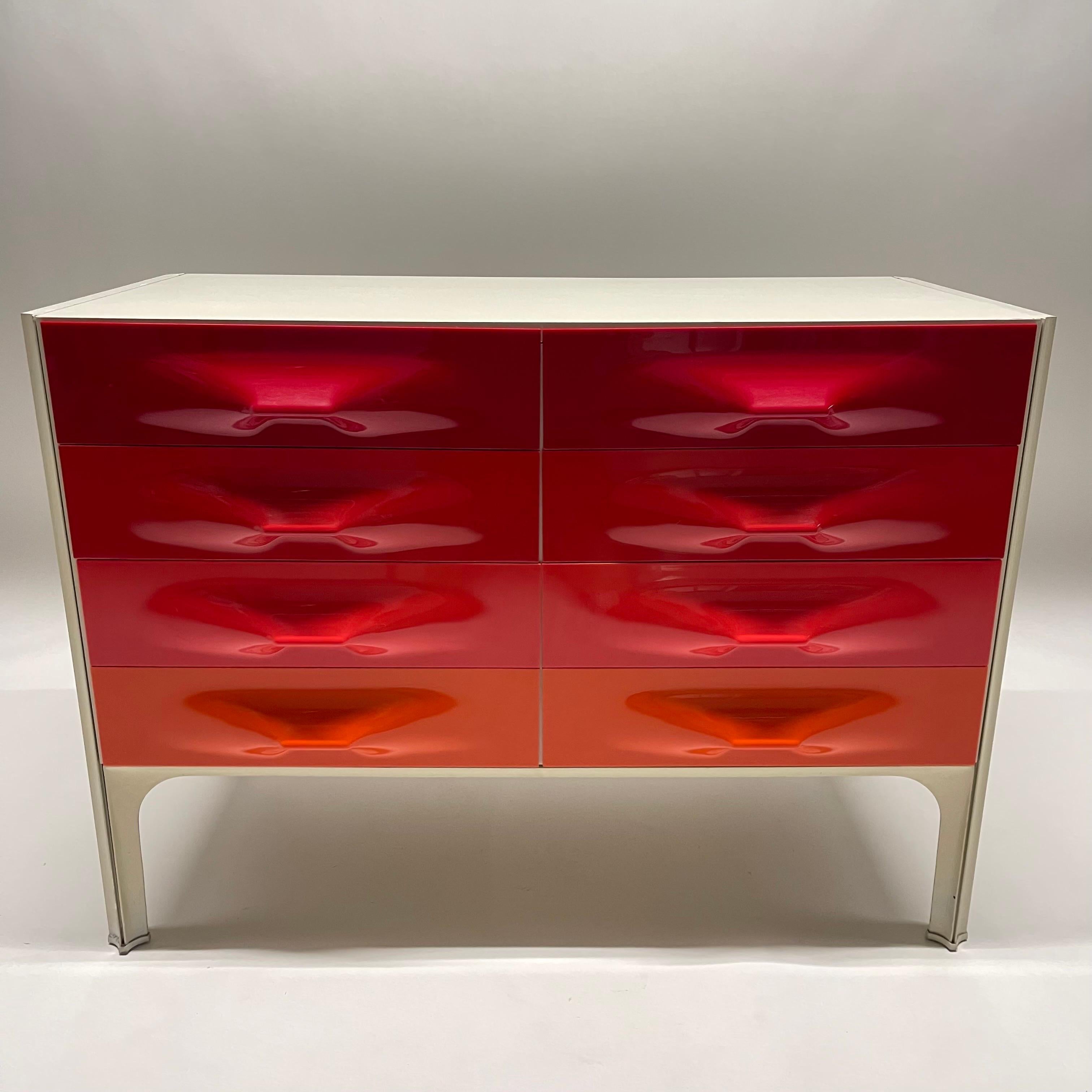Rare Red to Orange Ombre DF-2000 6 drawer Commode, Chest of Drawers, or Dresser, rendered in Molded Plastic drawer fronts with Laminated wood case and Aluminum frame and legs. Designed by Raymond Loewy from his X-Line Series for Doubinsky Freres,
