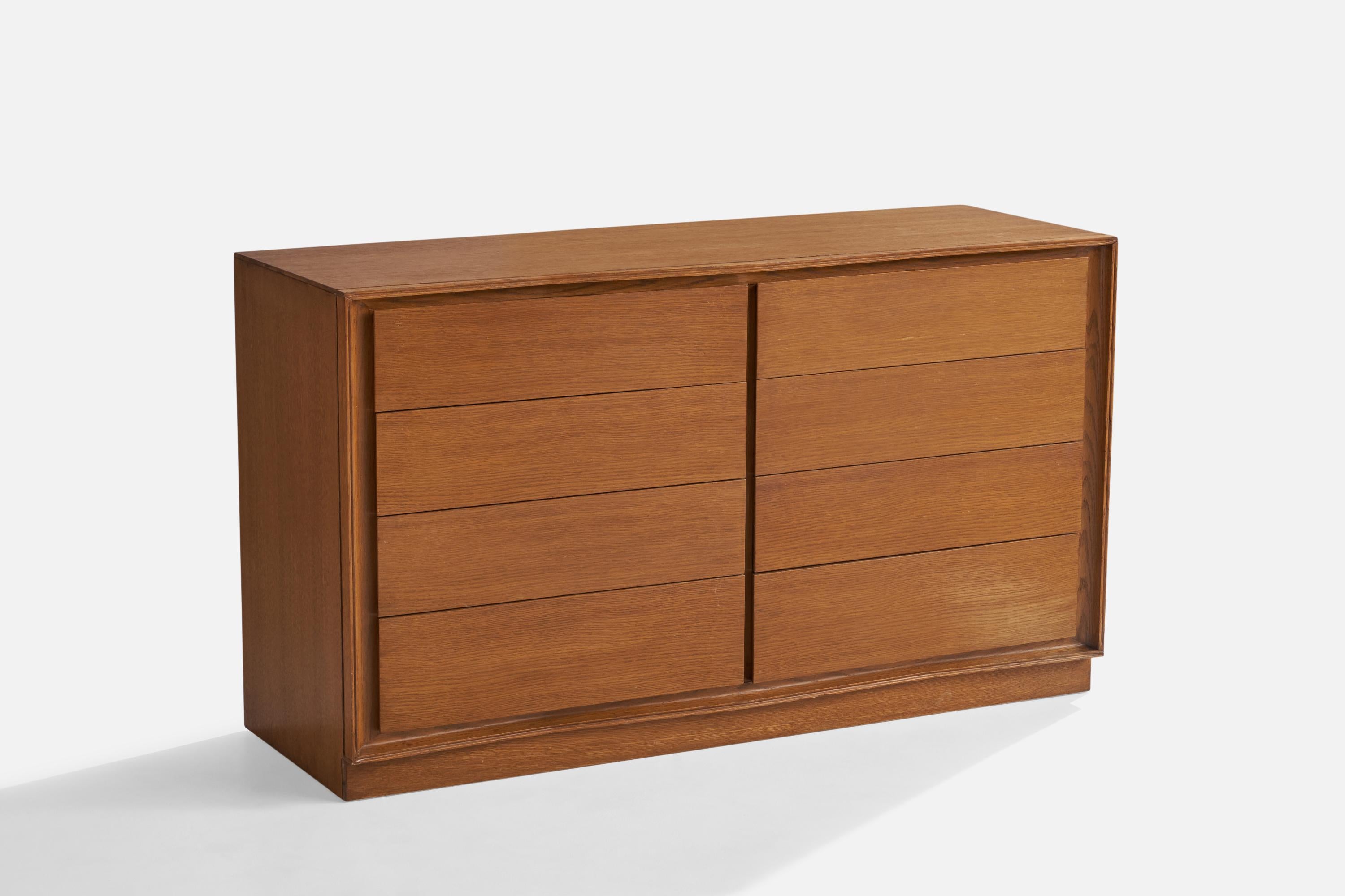 An oak dresser designed by Raymond Loewy and produced by Mengel Furniture Co, USA, 1950s.