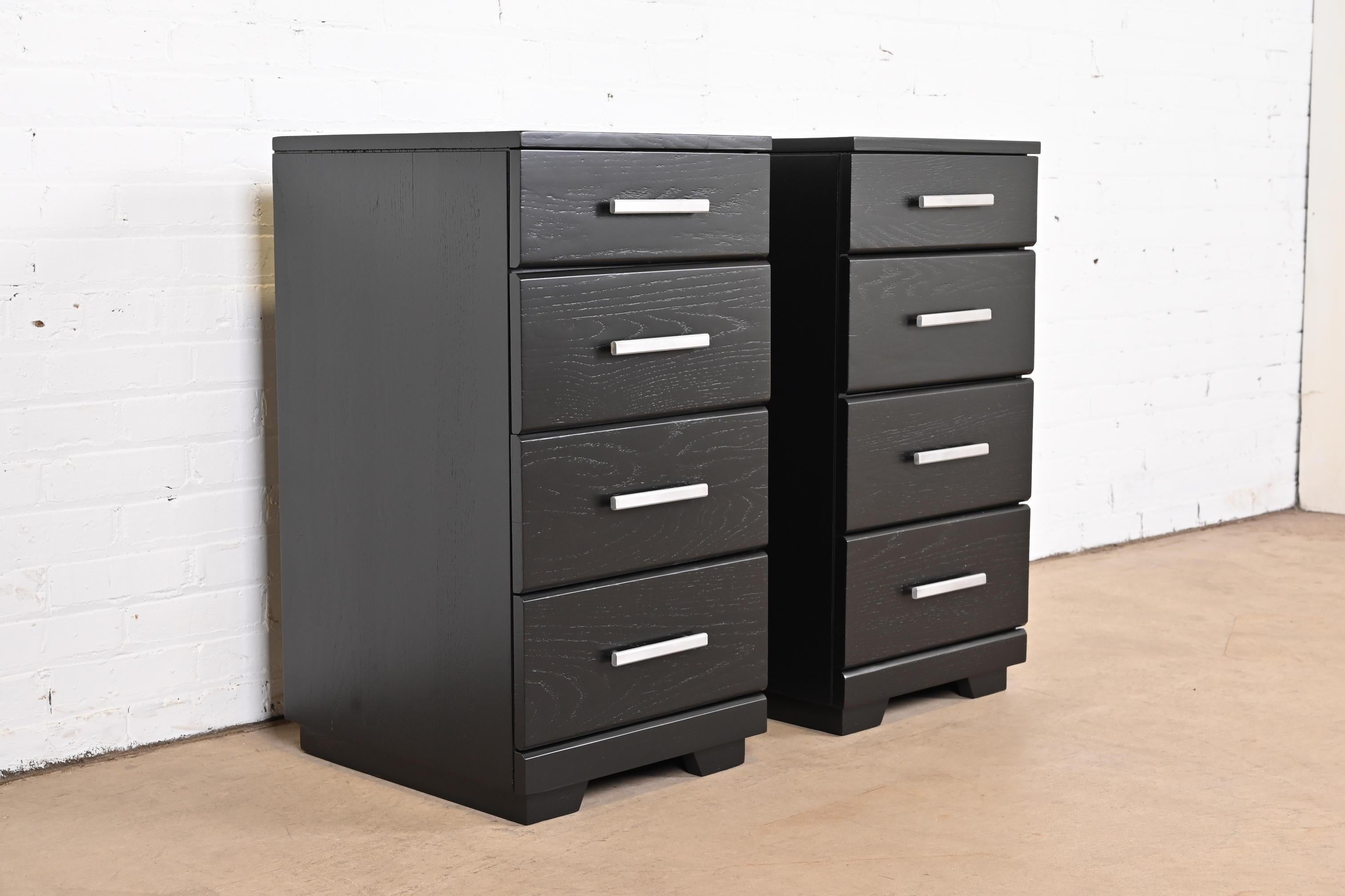 A gorgeous pair of Mid-Century Modern four-drawer nightstands

By Raymond Loewy for Mengel Furniture

USA, 1950s

Black lacquered oak, with original aluminum hardware.

Measures: 16