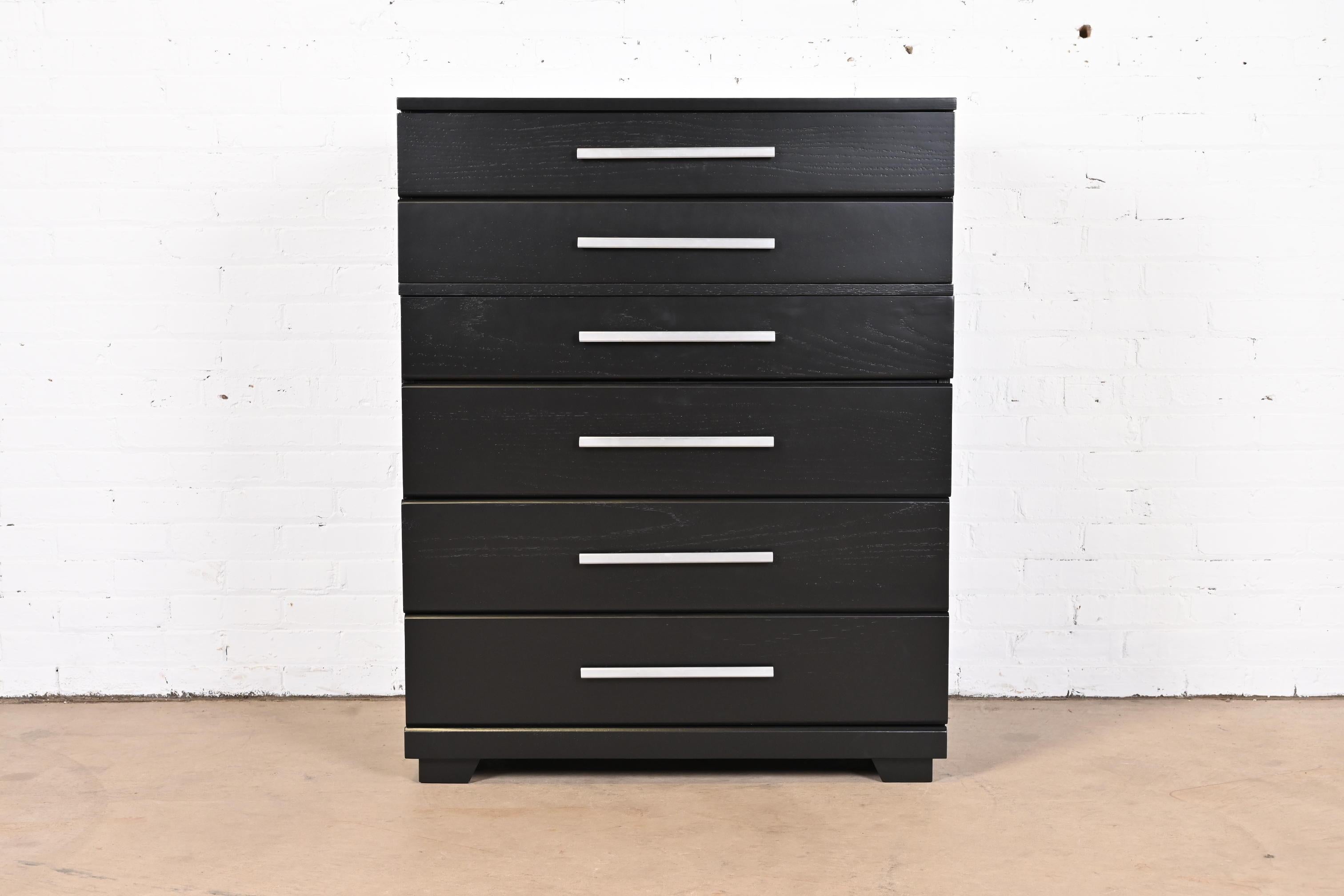 A gorgeous Mid-Century Modern six-drawer highboy dresser or chest of drawers

By Raymond Loewy for Mengel Furniture

USA, 1950s

Black lacquered oak, with original aluminum hardware.

Measures: 34