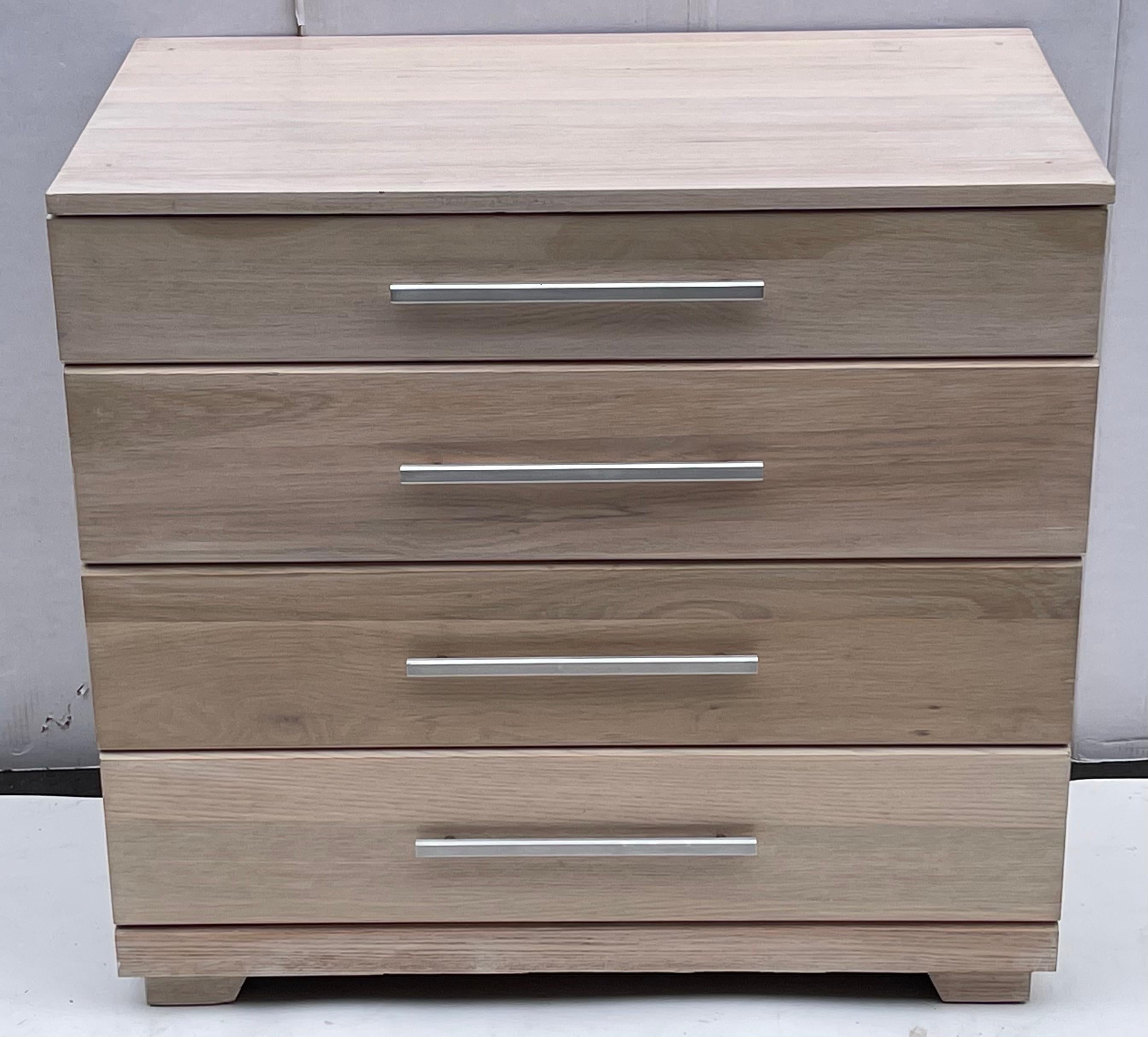 These are great all around with a modern form and cerused finish, they pack a decorating punch! This is a pair of bachelor’s chest designed by Raymond Loewy for Mengel Furniture. They have a clean cerused finish with a plank style construction. They