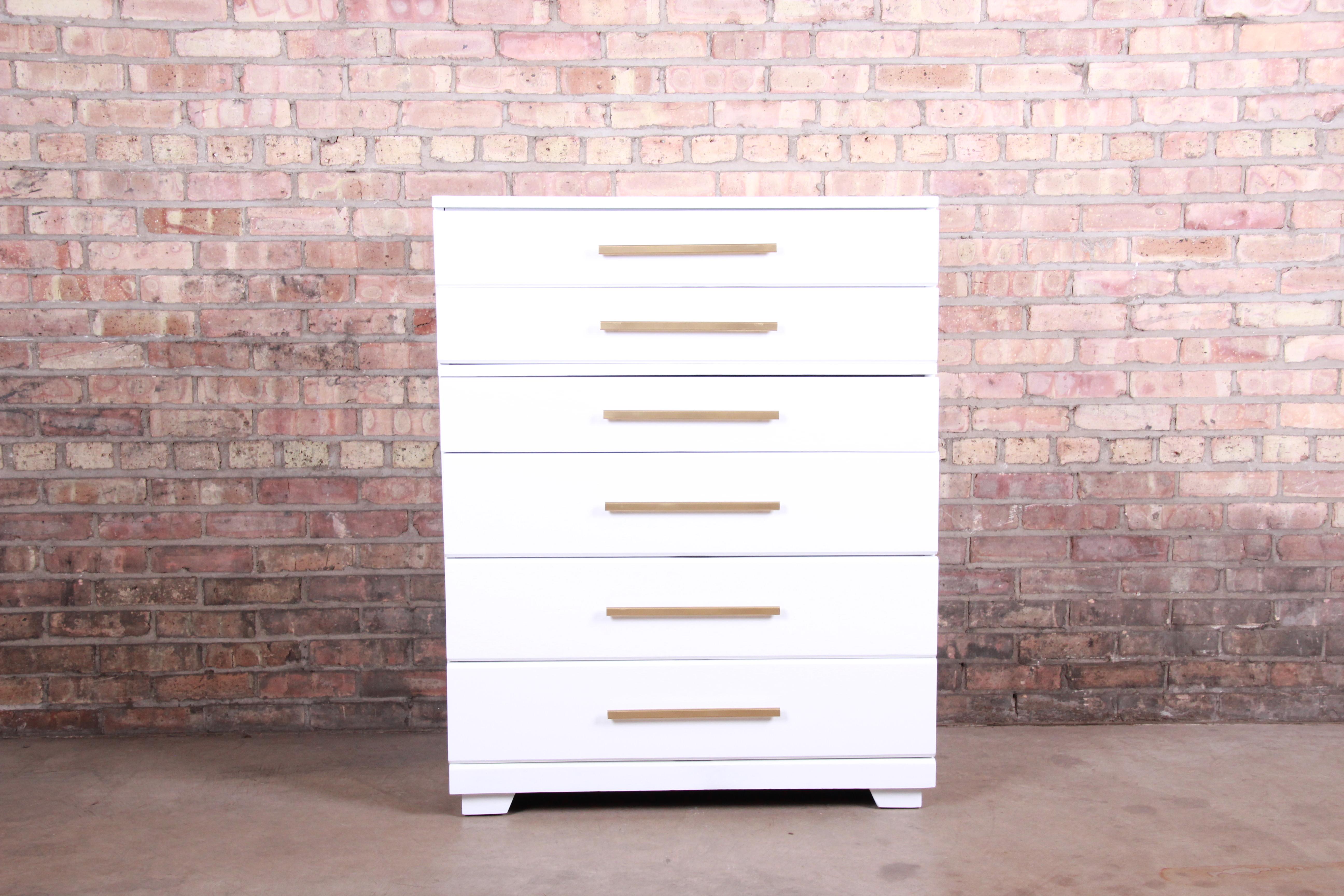 A gorgeous Mid-Century Modern six-drawer highboy dresser

By Raymond Loewy for Mengel Furniture

USA, 1950s

White lacquered oak, with brass-finished hardware.

Measures: 34