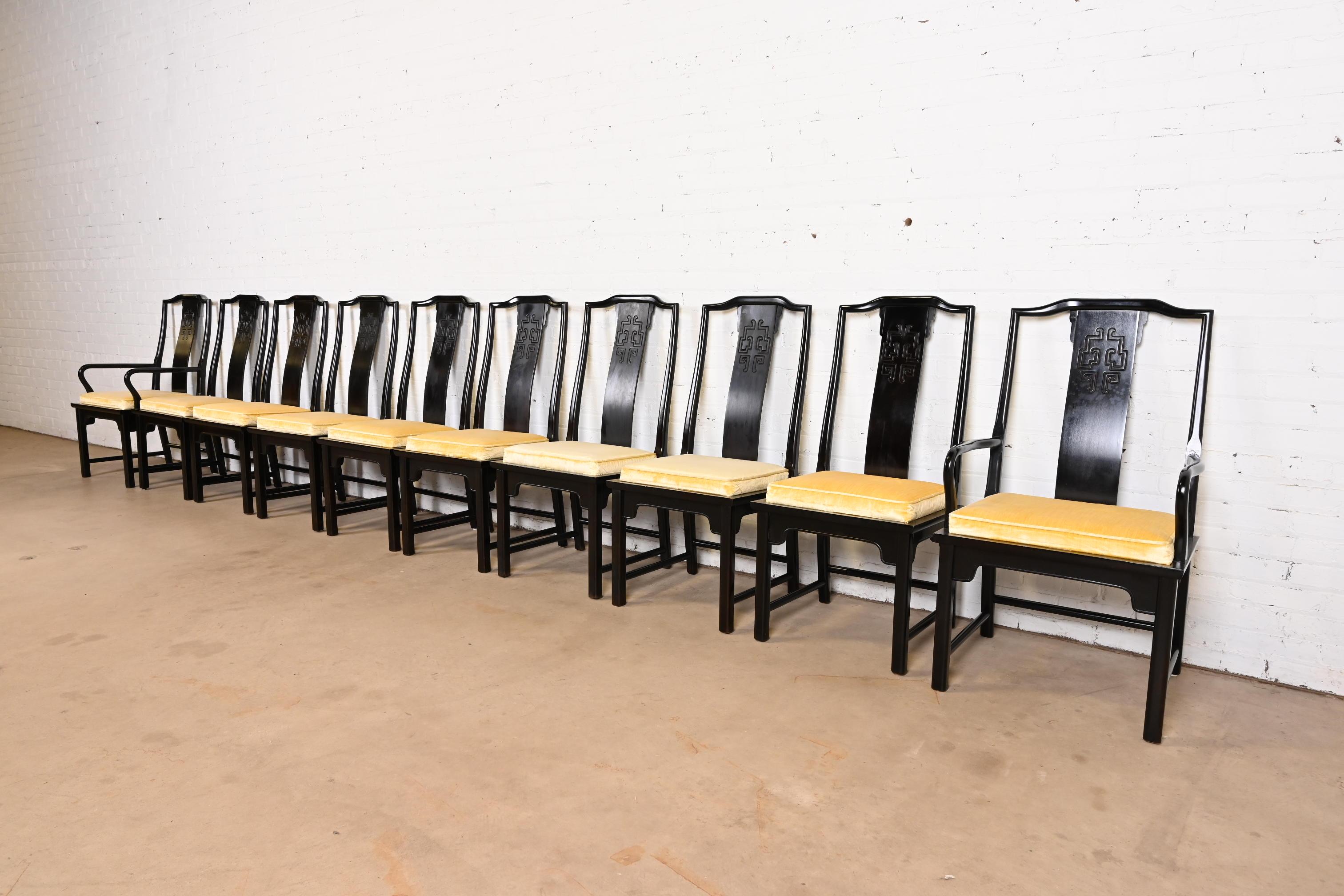 A gorgeous set of ten mid-century modern Hollywood Regency Chinoiserie dining chairs

By Raymond Sobota for Century Furniture

USA, Circa 1970s

Sculpted black lacquered walnut, with carved Asian details and upholstered seats.

Measures:
Side chairs