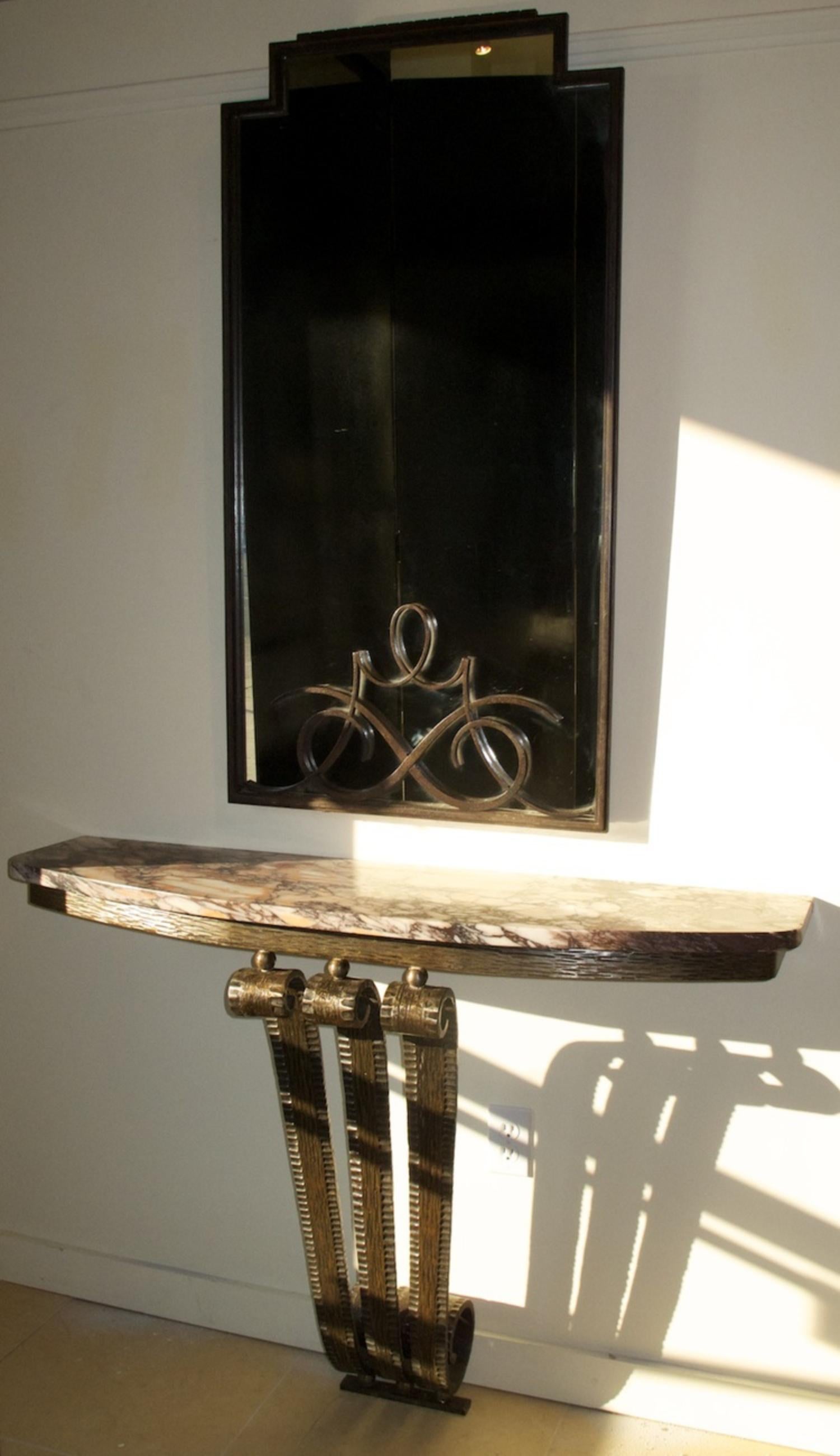 French Art Deco console by Raymond Subes in forged iron with marble top, circa 1935. Measures: 47