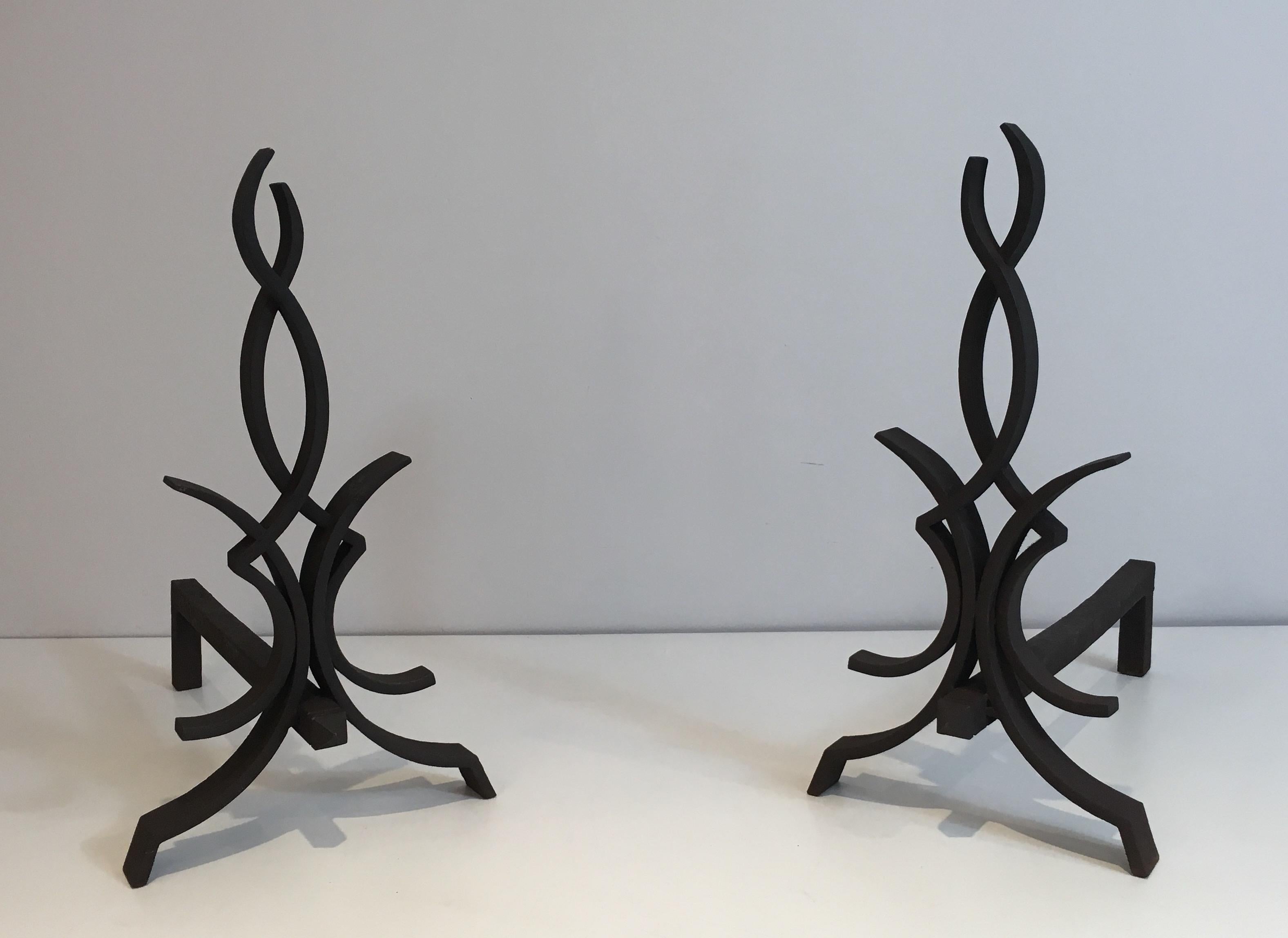 This fire place tools are made of wrought iron. This is a work by famous French designer Raymon Subes, Circa 1940.