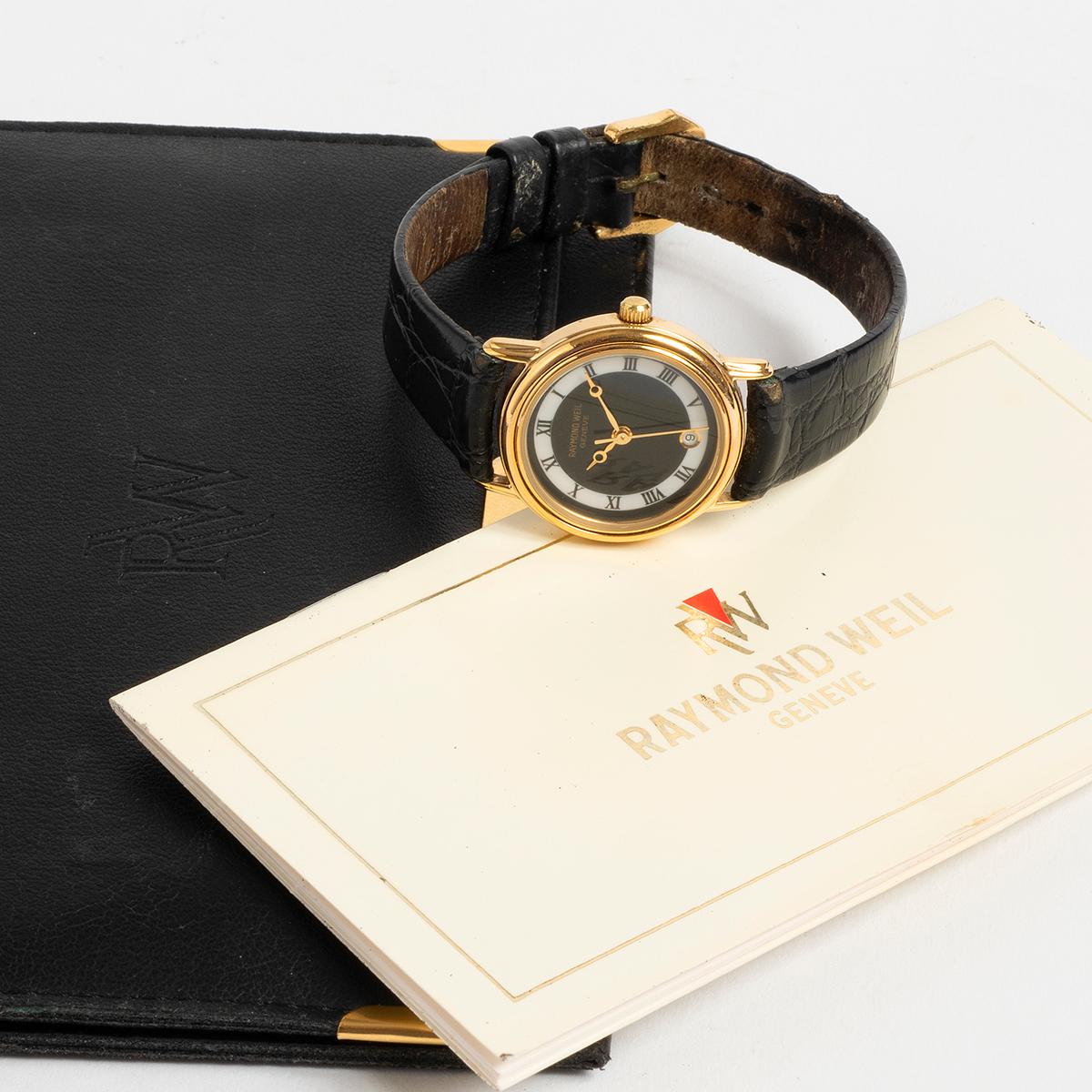 Our wonderful vintage Raymond Weil reference 5532 quartz, with 26mm case, features a gold capped stainless steel case with art deco style dial of black / white and with date fitted with its original strap with notable use , and original tang buckle.