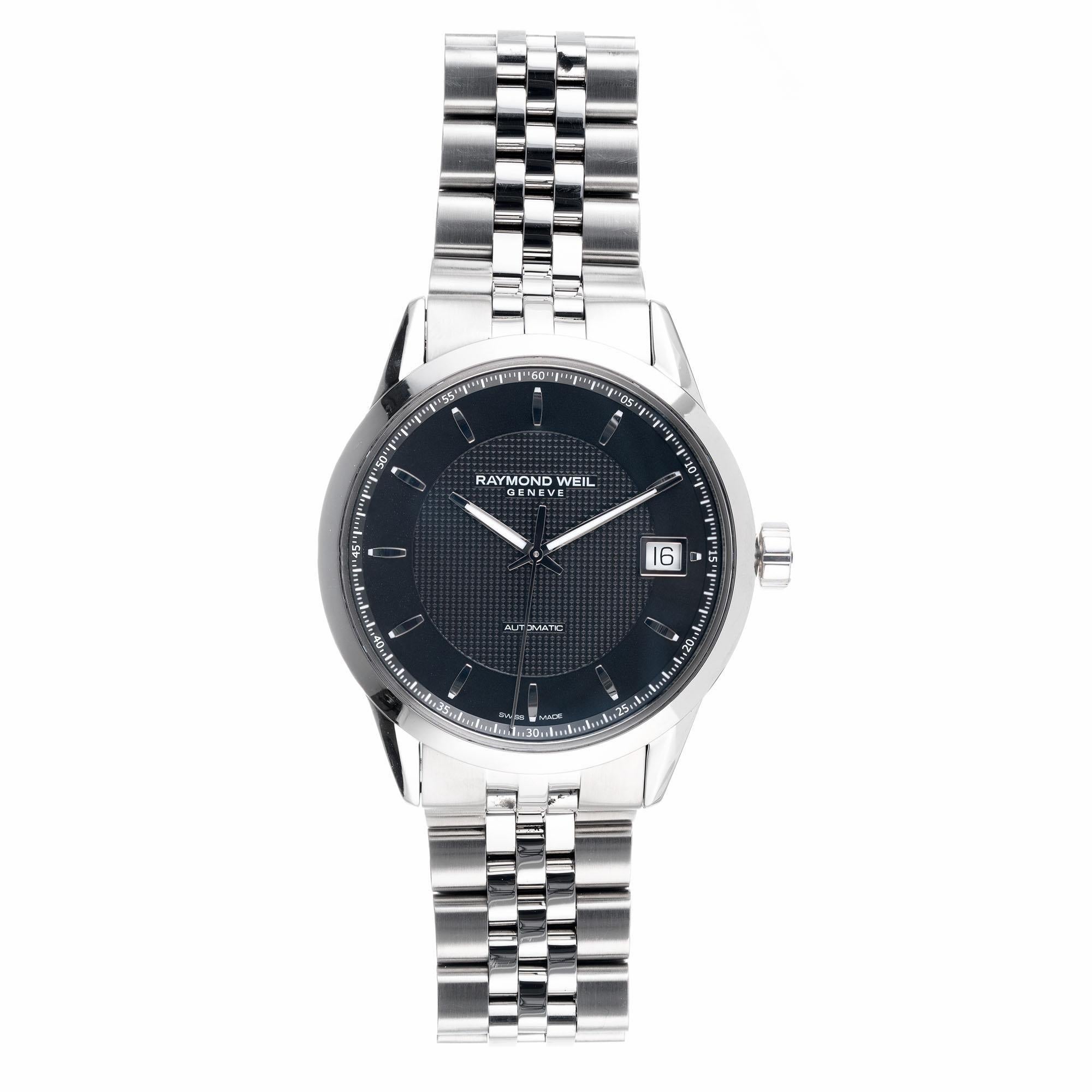 Raymond Weil stainless steel automatic date Men's wristwatch with black dial. Sapphire crystals front and back.

Length: 50.67mm
Width: 42mm
Band width at case: 22mm
Case thickness: 10.61mm
Crystal: Sapphire
Dial: Black
Outside case: 2740 K