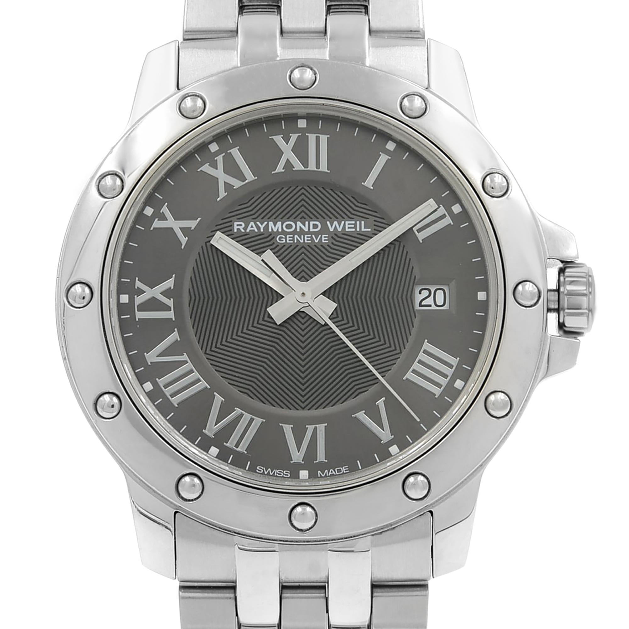 This display model Raymond Weil Tango 5599-ST-00608 is a beautiful men's timepiece that is powered by a quartz movement which is cased in a stainless steel case. It has a round shape face, date dial and has hand roman numerals style markers. It is