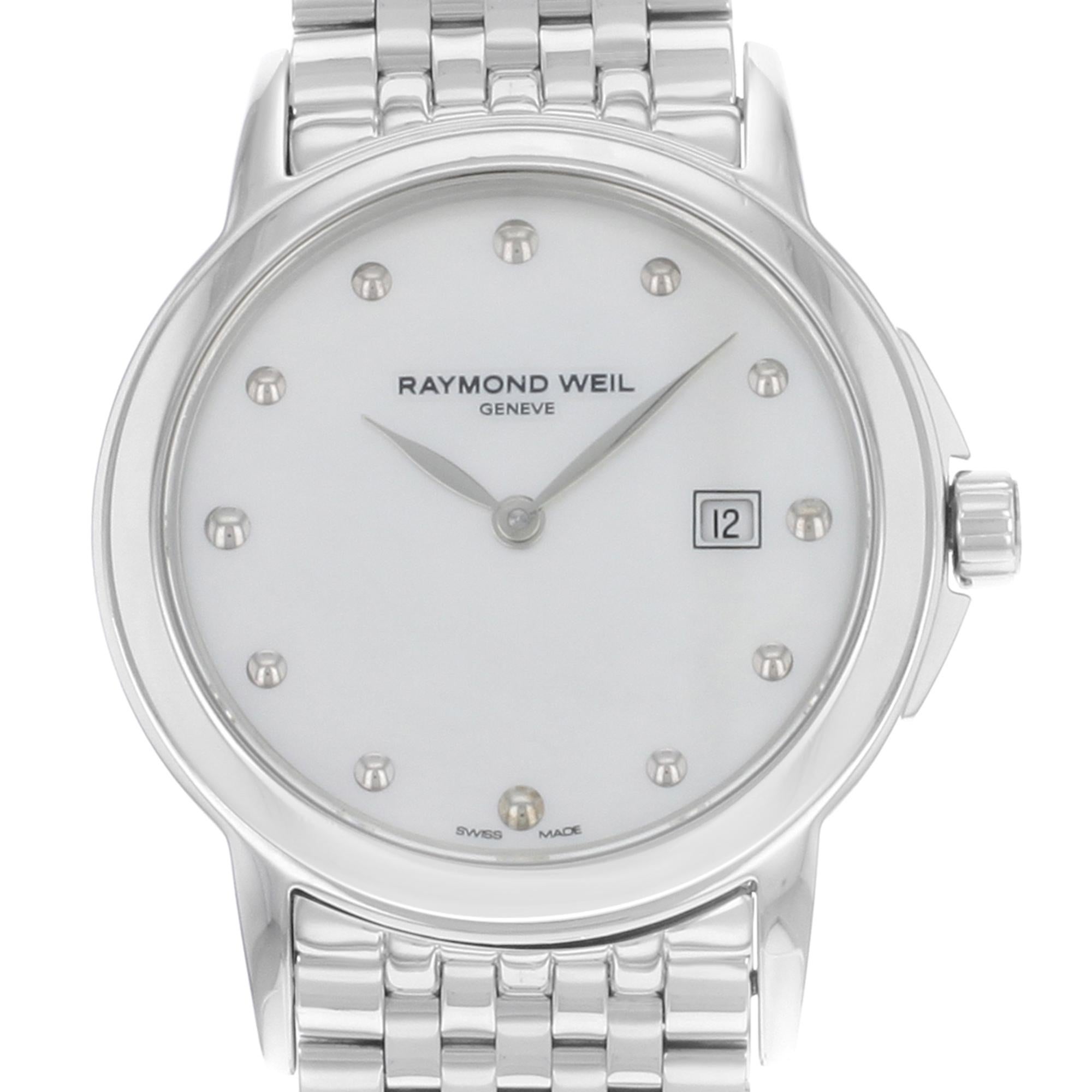 This display model Raymond Weil Tradition  5966-ST-97001  is a beautiful Ladie's timepiece that is powered by quartz (battery) movement which is cased in a stainless steel case. It has a round shape face, date indicator dial and has hand dots style