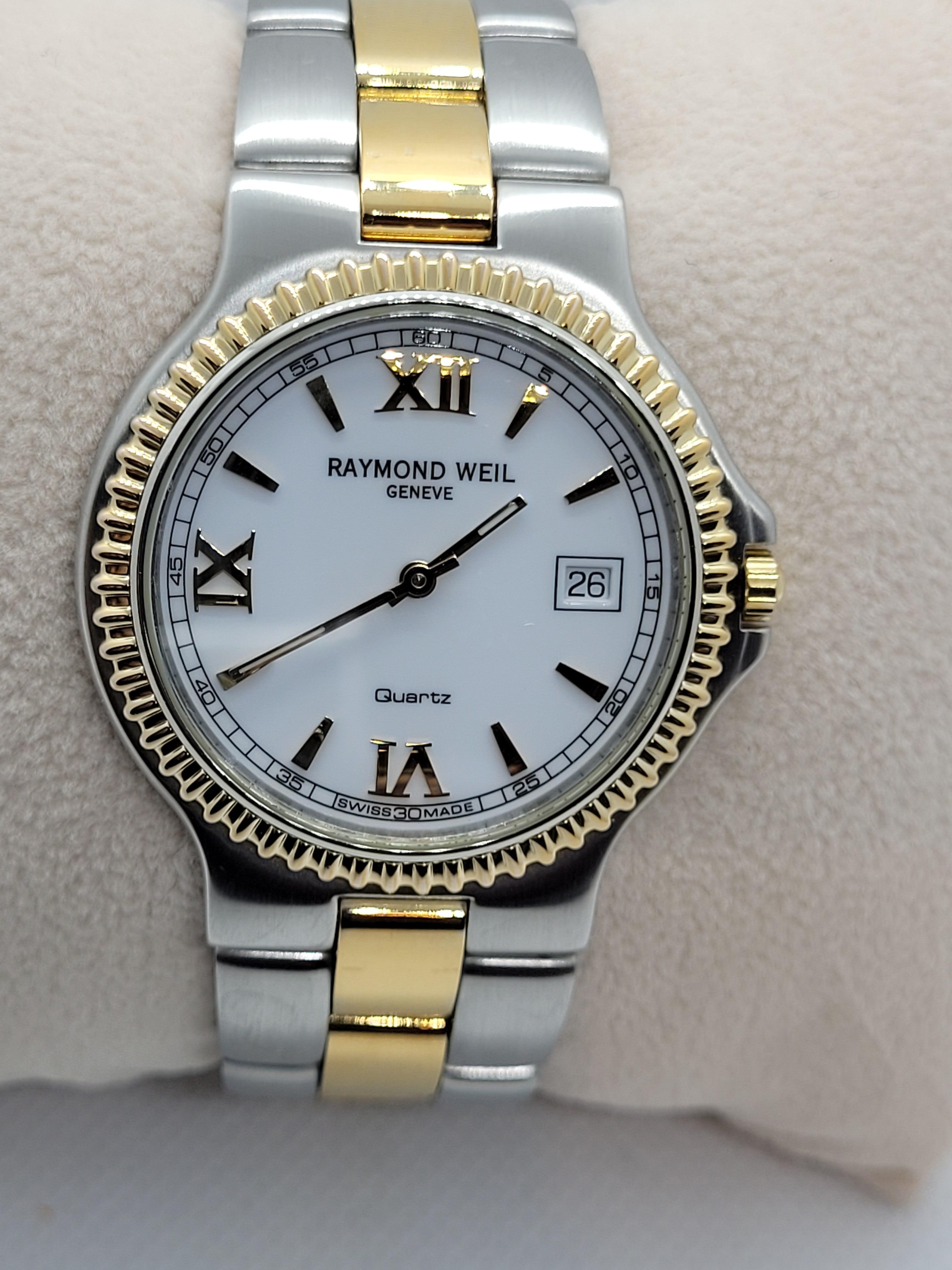 Raymond Weil watch, model number 9280 X565729 in good condition with very few minor scratches, pre-owned with original box. This watch is a great every day watch and also suitable to for dress attire. The watch is stainless steel and 18kt yellow