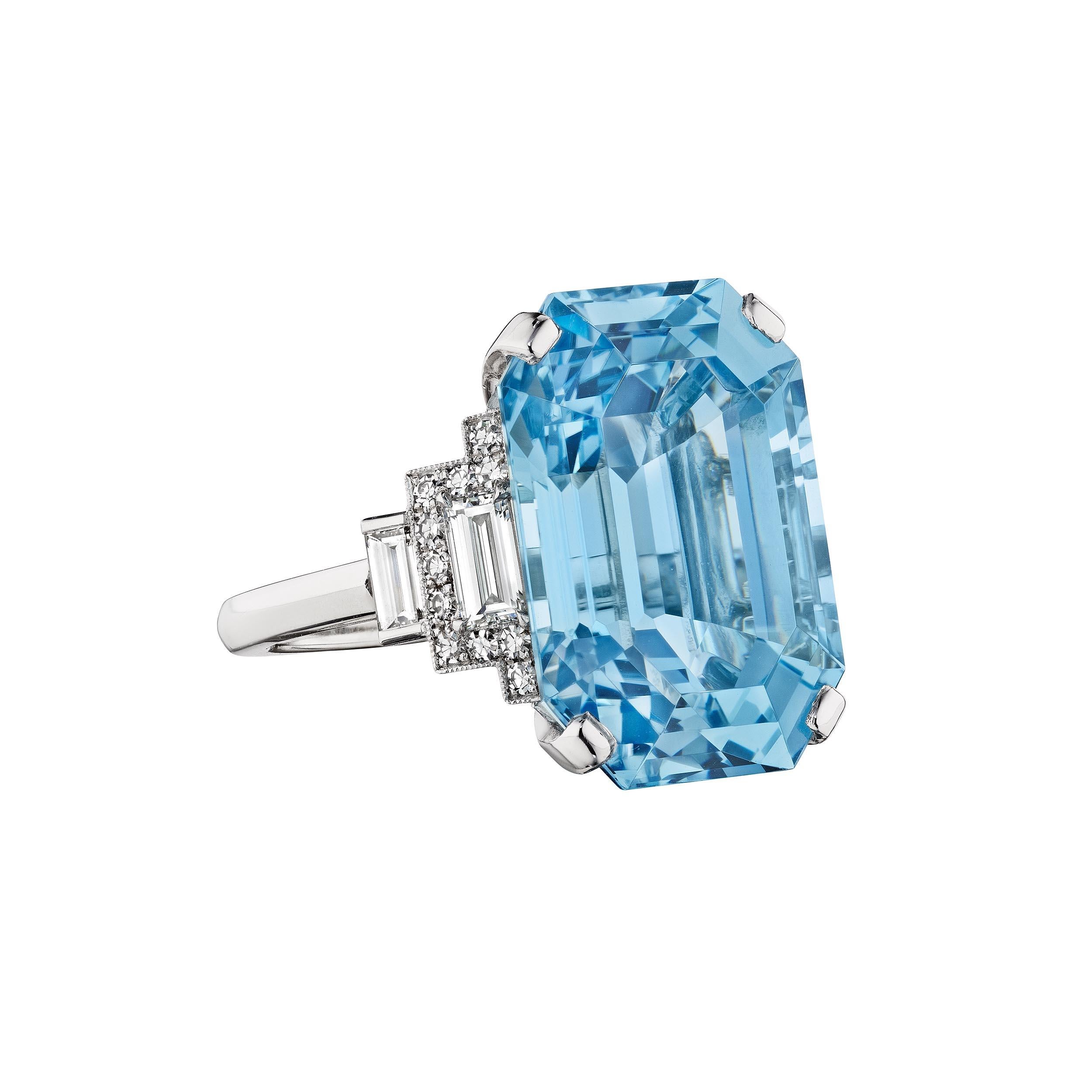 Once in a blue moon.  This Raymond Yard 13.70 carat vintage emerald cut aquamarine, diamond, and platinum ring is both rare to find and hard to resist.  Signed Yard.  Total diamond weight is .73 carats.  Size 5 1/2.  Can be custom sized.  