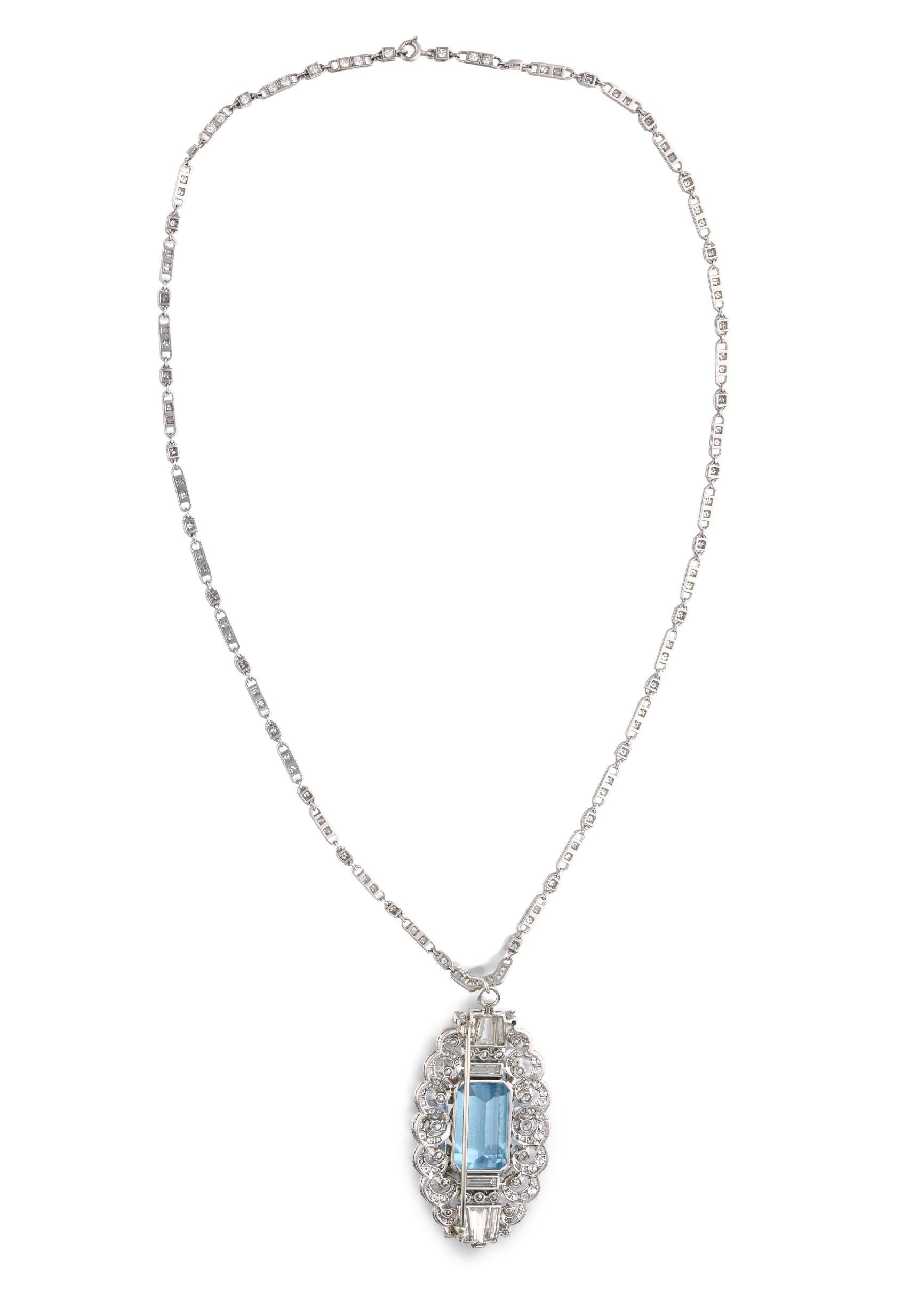 Raymond Yard necklace featuring a stunning emerald-cut aquamarine, weighing approximately 21 carats. This center stone is accented by round, baguette, and tapered baguette-shaped diamonds, weighing a total of approximately 10 carats. These stones
