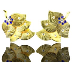 Raymond Yard Diamond and Sapphire Clips, c. 1960s.