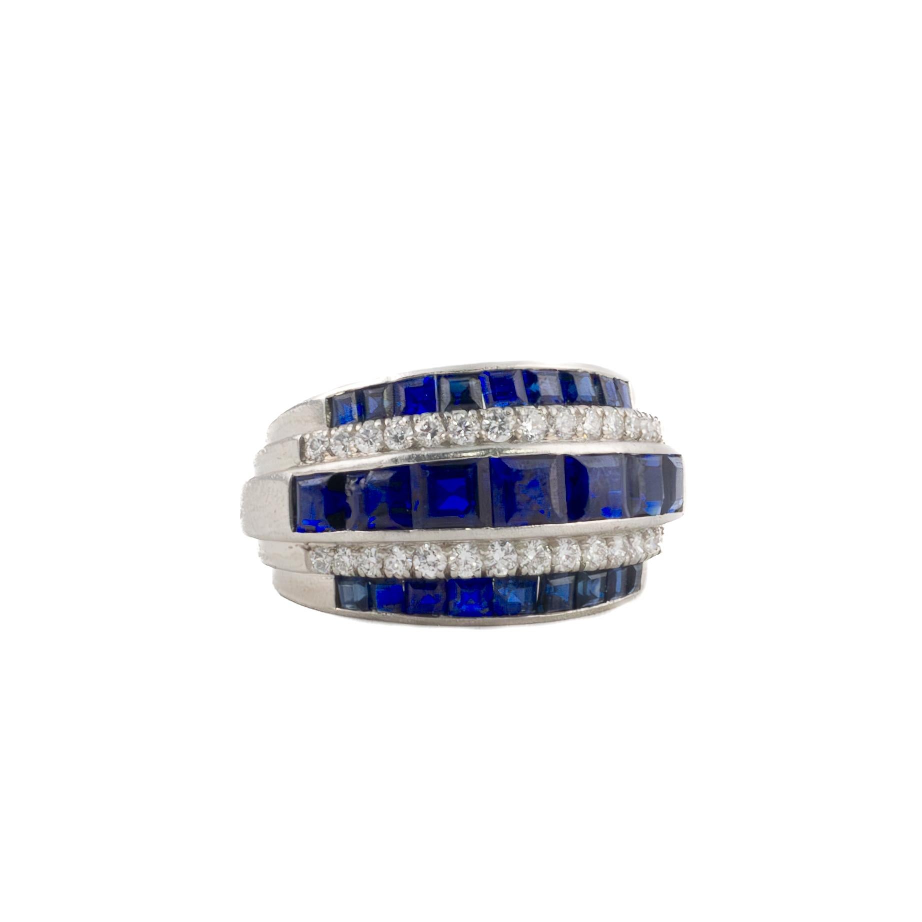 Raymond Yard Sapphire and Diamond Ring

This refined Raymond Yard ring combines timeless elegance with exceptional craftsmanship. Designed in platinum, the ring features vibrant square-cut sapphires set in three bold rows, alternating with sparkling