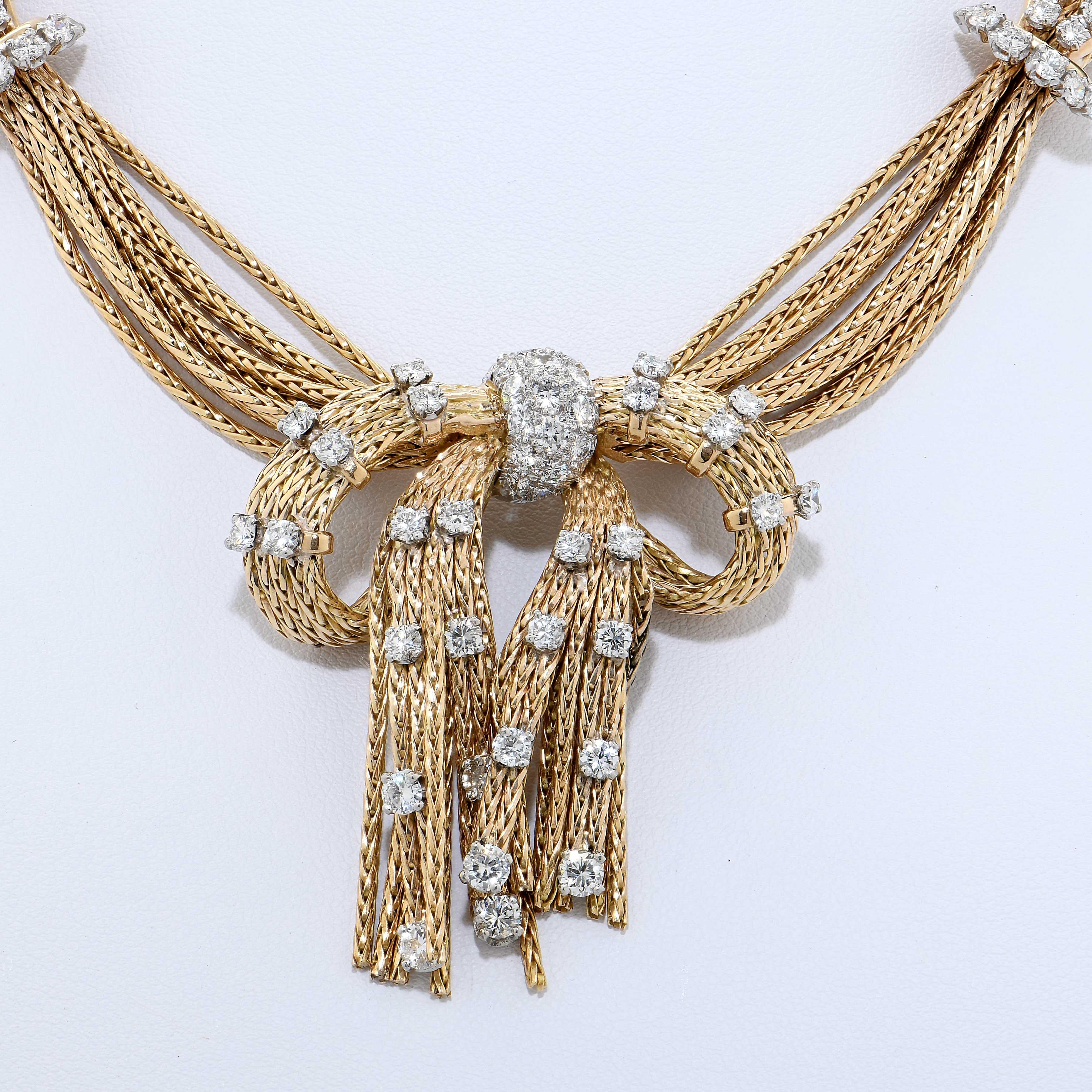 Raymond Yard Strand Diamond Necklace Circa 1950 in 18 Karat Yellow Gold featuring 140 round brilliant cut diamonds G color VS clarity with a total estimated weight of 12 carats. 
This gorgeous necklace flows beautifully and is worthy of a great