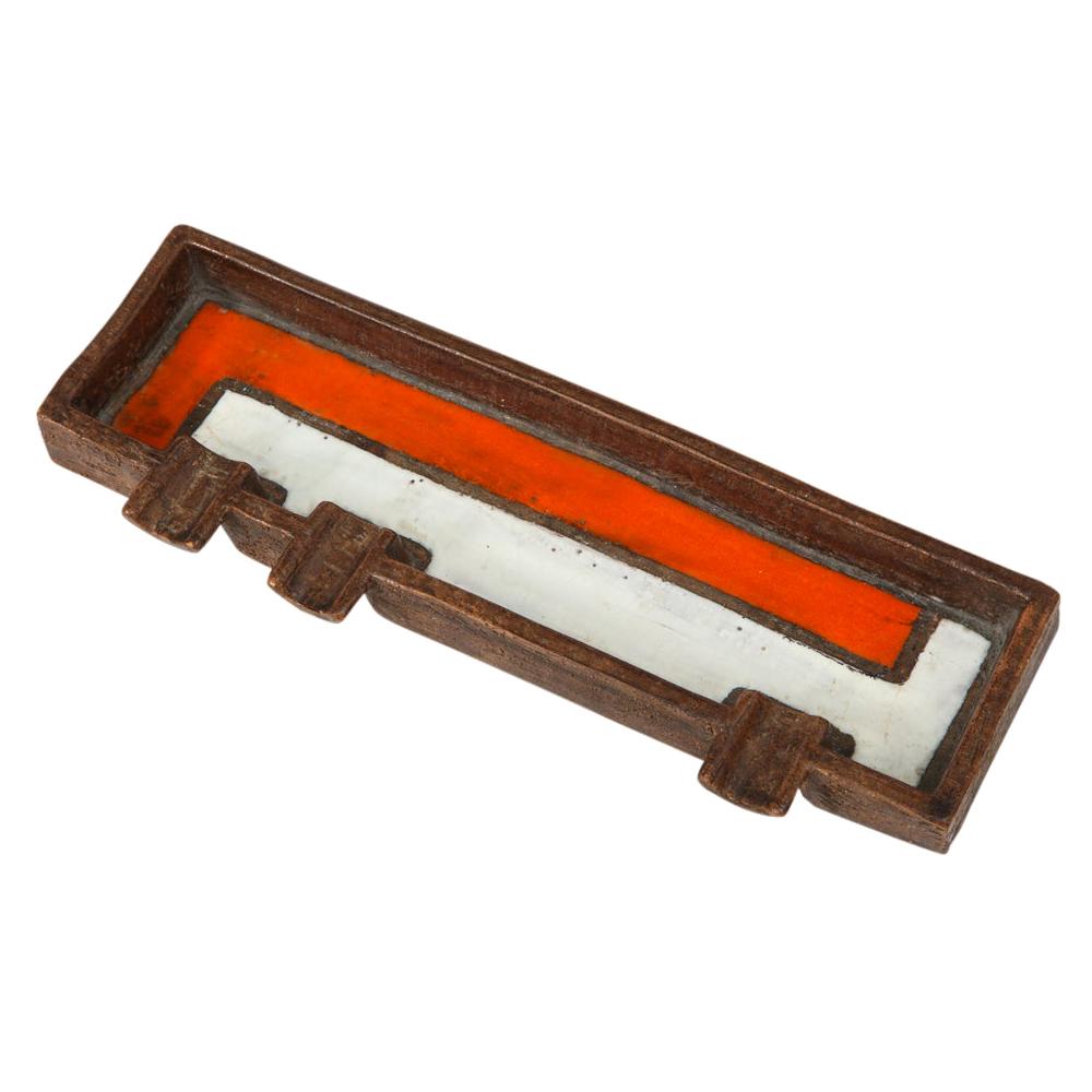 Aldo Londi Bitossi for Raymor ashtray, Mondrian orange, white, signed. Long ashtray with 3 cigarette or cigar rests. Decorated with a Mondrian inspired geometric pattern of white and orange glaze over a coarse matte brown raw clay. Signed with an