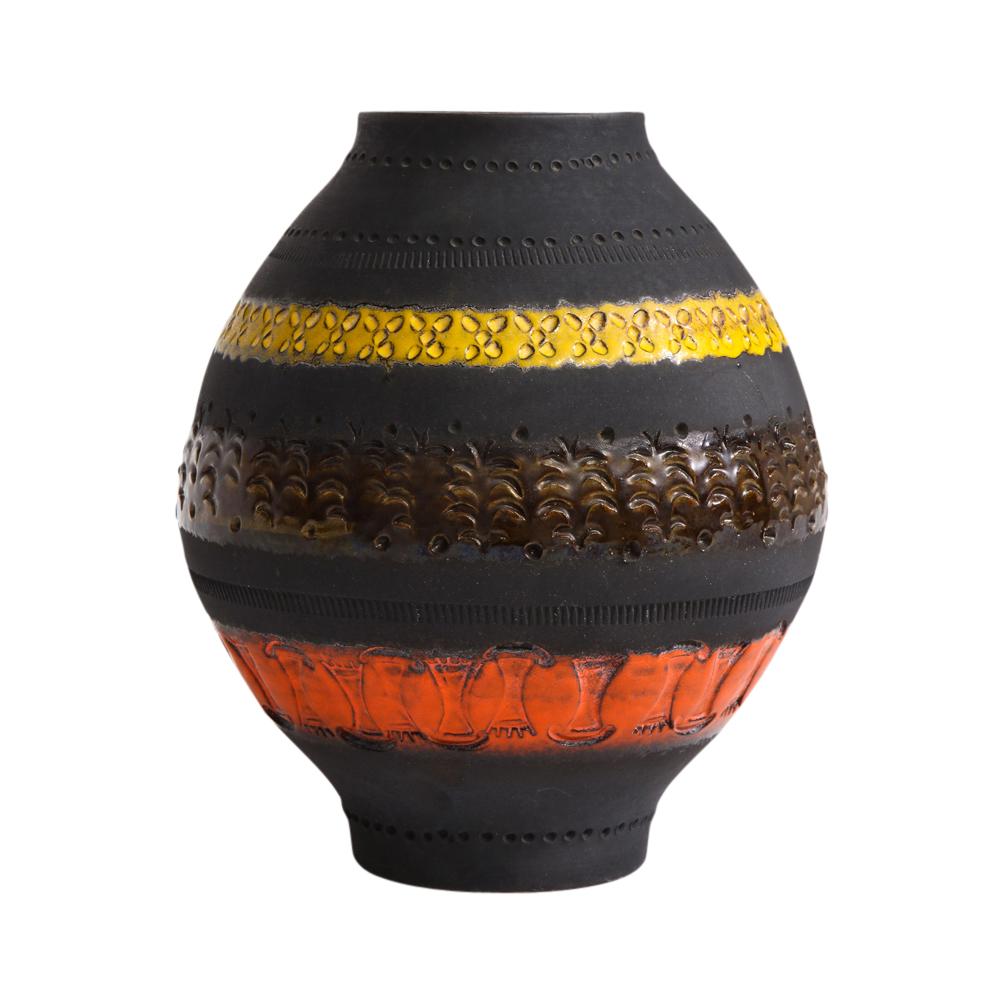 Bitossi for Raymor vase, ceramic, matte black, yellow and orange, signed. From Bitossi's Genovese series, designed by Aldo Londi. The simple ovoid form is decorated with 3 impressed bands of color: yellow, chestnut brown and orange. Signed on