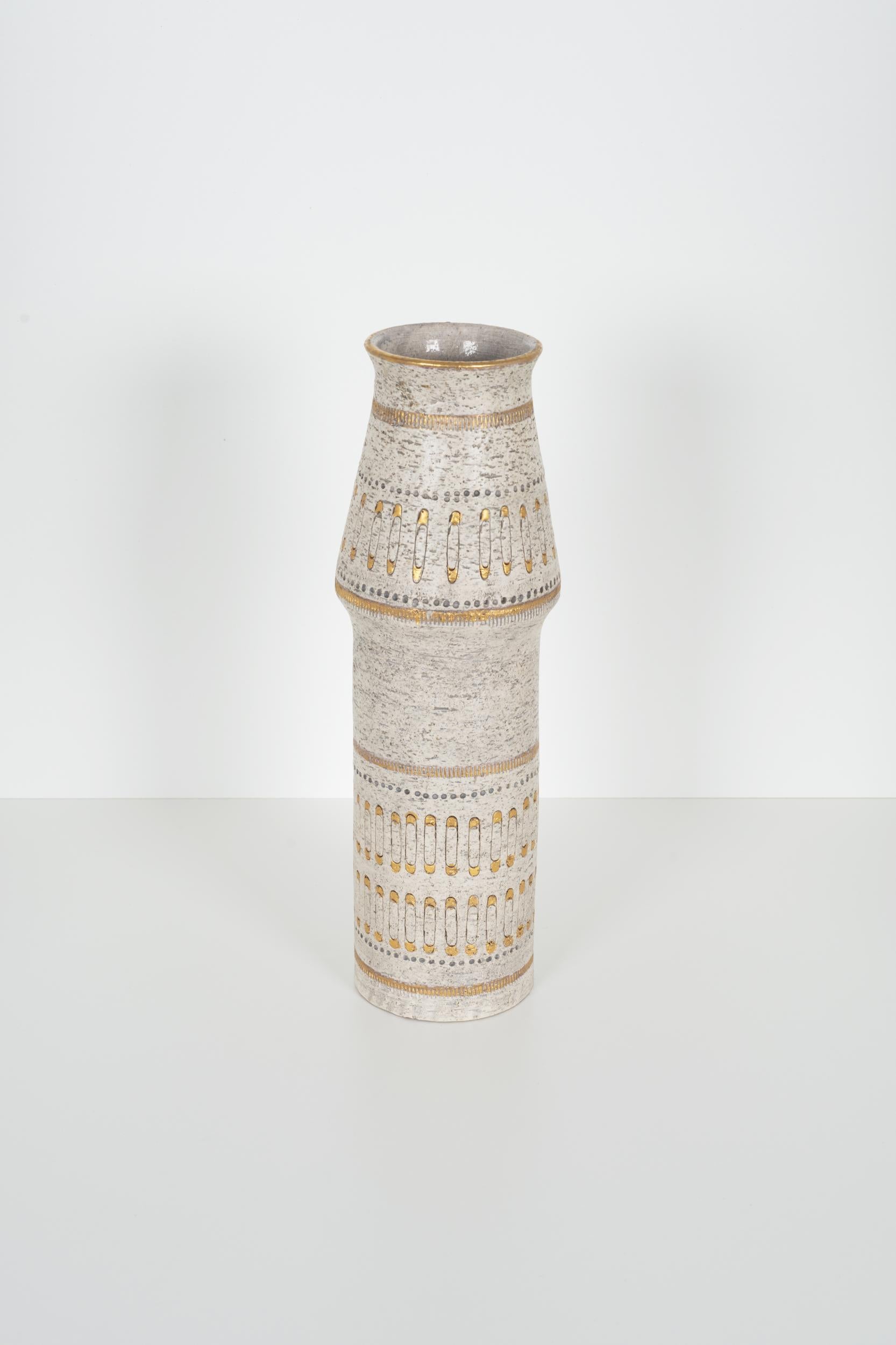 Raymor white and gold Italian vase, alternating decorative bands. 
Signed Italy 75/335
Small chip on underside, shown in last image.