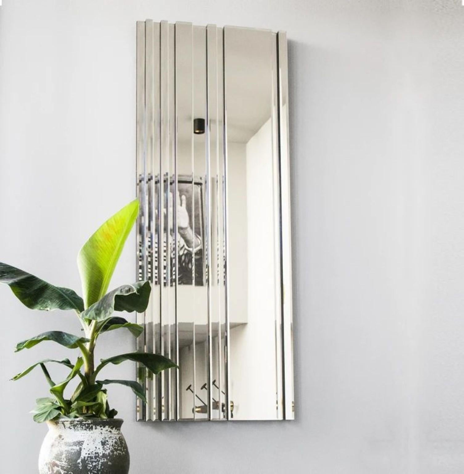Rays of light mirror.
Dimensions: W 62 x D 4 x H 160 cm
Material: 6 mm faceted mirror on black painted MDF
Weight: 35 kg.

Accentuate your home decor with a Reflections Copenhagen Rays of Light full body mirror. By adding this mirror to your