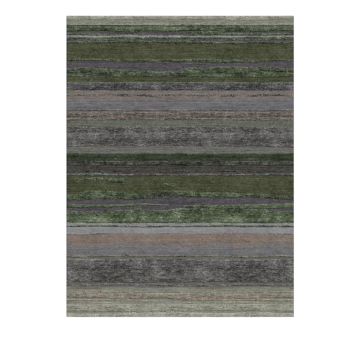 A creative expression of simple forms and color, this exquisite rug is a sublime accent to any entryway, bedroom, or study decor. Handmade in India with Tibetan knotting technique, this piece combines local dyes with wool and bamboo fibers, layering