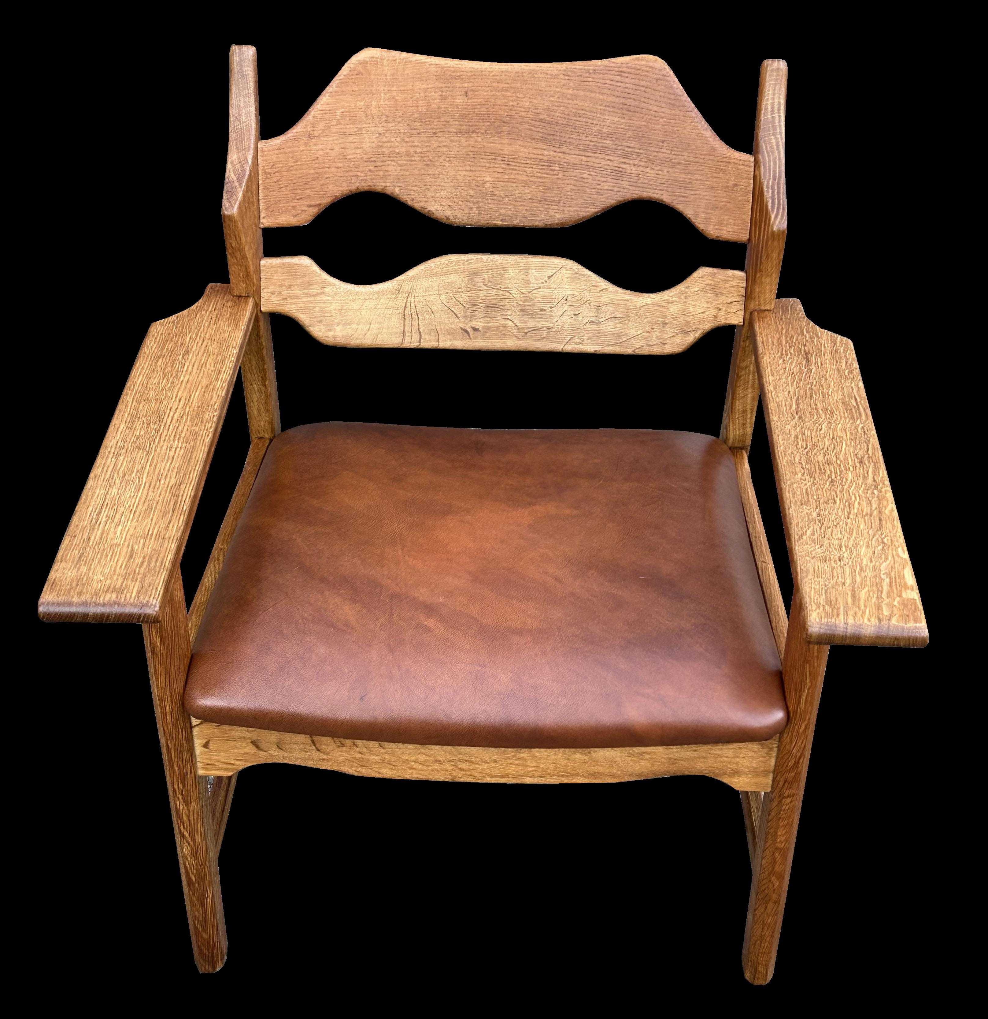 This is a very good original example of this very stylish Lounge chair in nicely patinated Oak with leather seat.