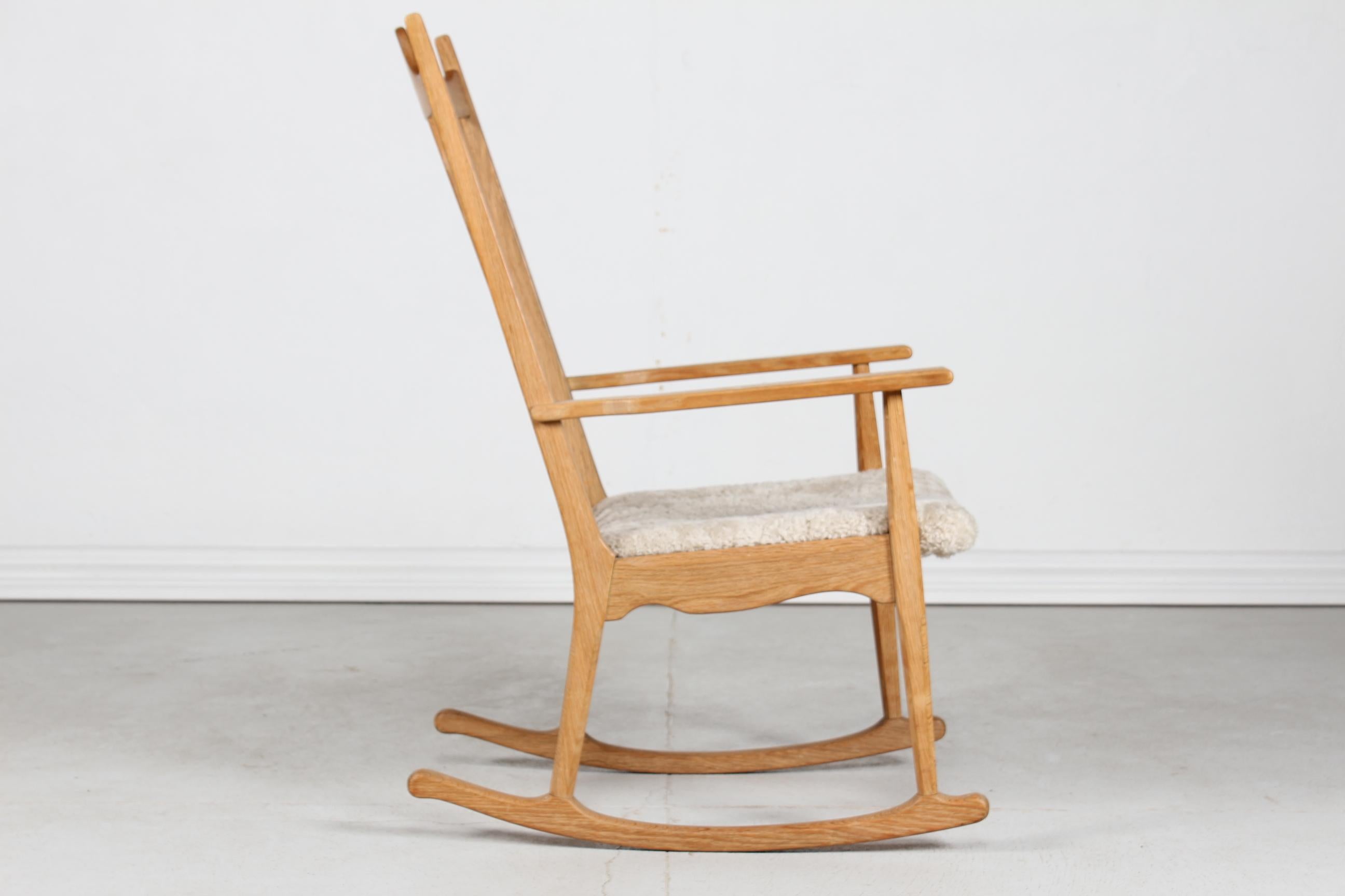Danish Razor Blade Henning Kjærnulf Rocking Chair by EG Møbler Solid Oak + Sheepskin  For Sale