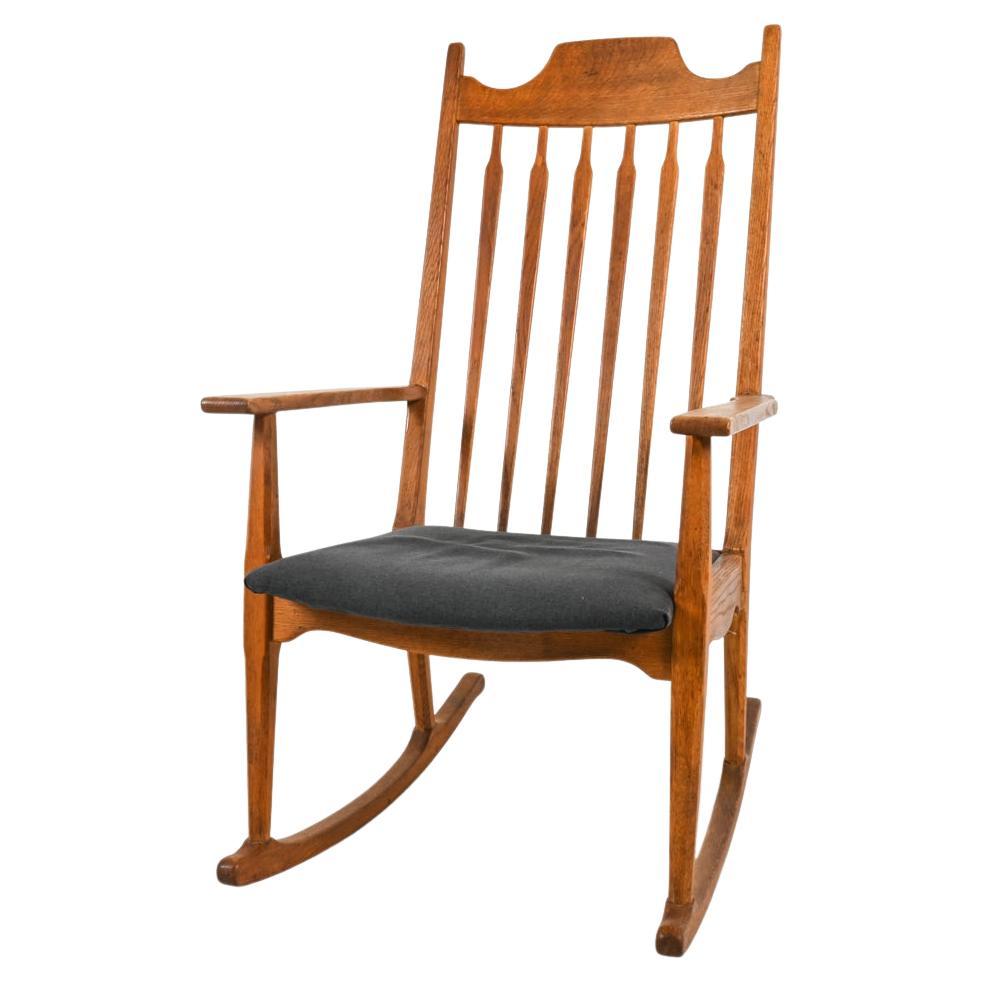 "Razorblade" Oak Rocking Chair By Henning Kjaernulf For Sale