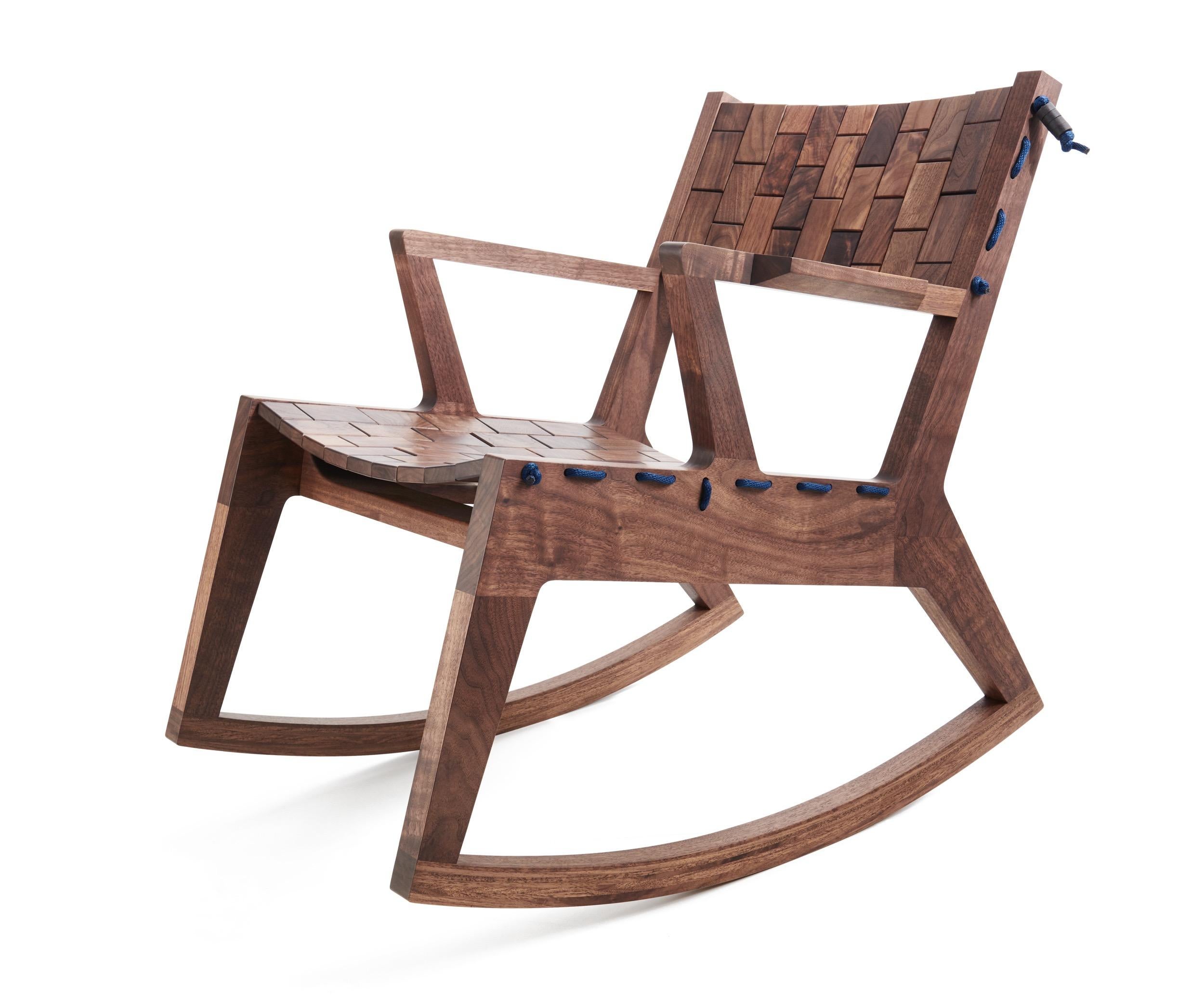 Woodsport RB rocking chair. Named after the running bond pattern in which bricks are laid. Individual pieces are laced together with high grade polyester rope, creating a soft surface that flexes with the occupant. The chair is detailed with burl