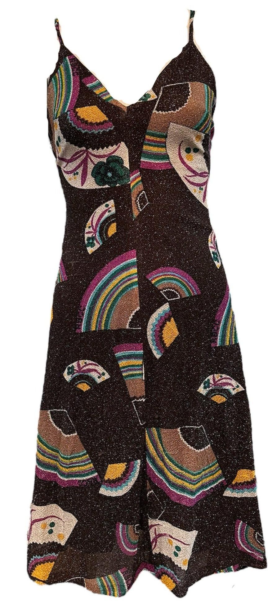 Channel the glitz and glamour of the 70s with this French Lurex Glam Rainbow Dress & Jacket Ensemble from the iconic Right Bank Clothing Company (RBCC). Featuring a stunning geo floral and pop art design, this ensemble includes a dress with