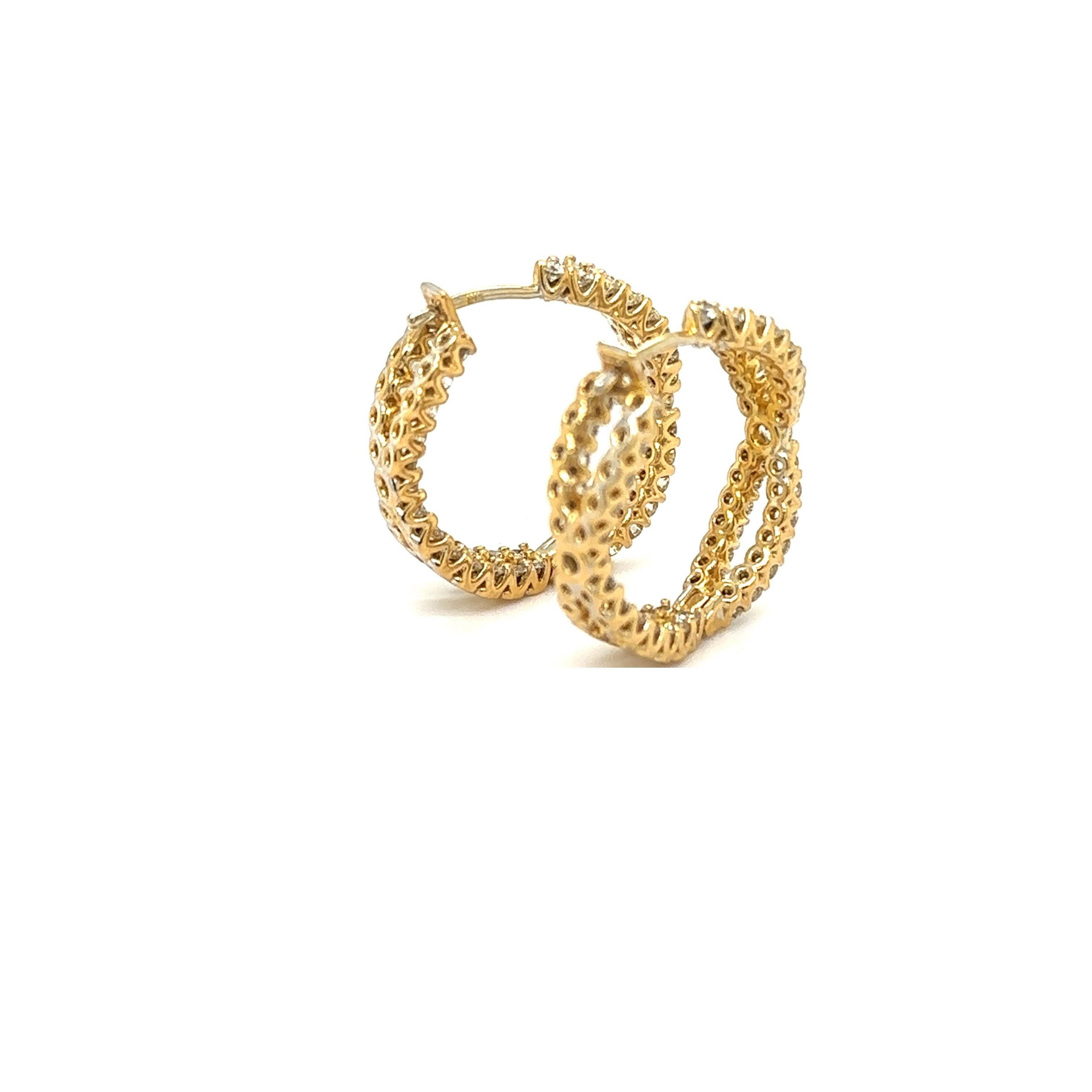 18K Yellow Gold Hoop Earrings with Diamonds

Metal:                  18K Yellow Gold
Diamond Info:    G/H VS, 110 Round Brilliant Diamonds 2.86 Cwt.
Total Ct Weight:  2.86 Cwt.
Item Weight:       9.90 gm
Measurements:  23.60 mm
