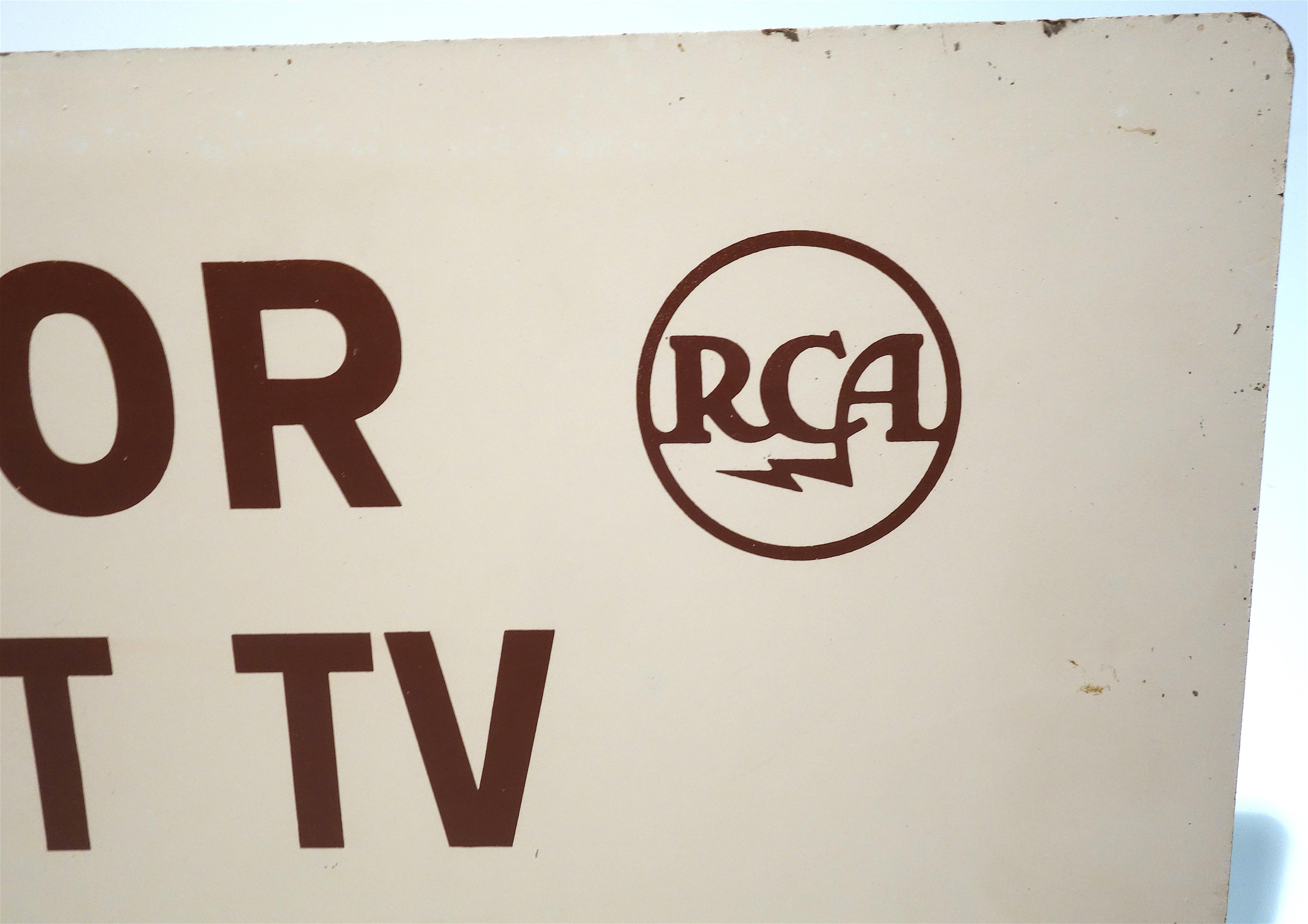 American RCA Portable TV Advertising Sign Circa Mid-20th Century Brown Over Beige On Wood For Sale
